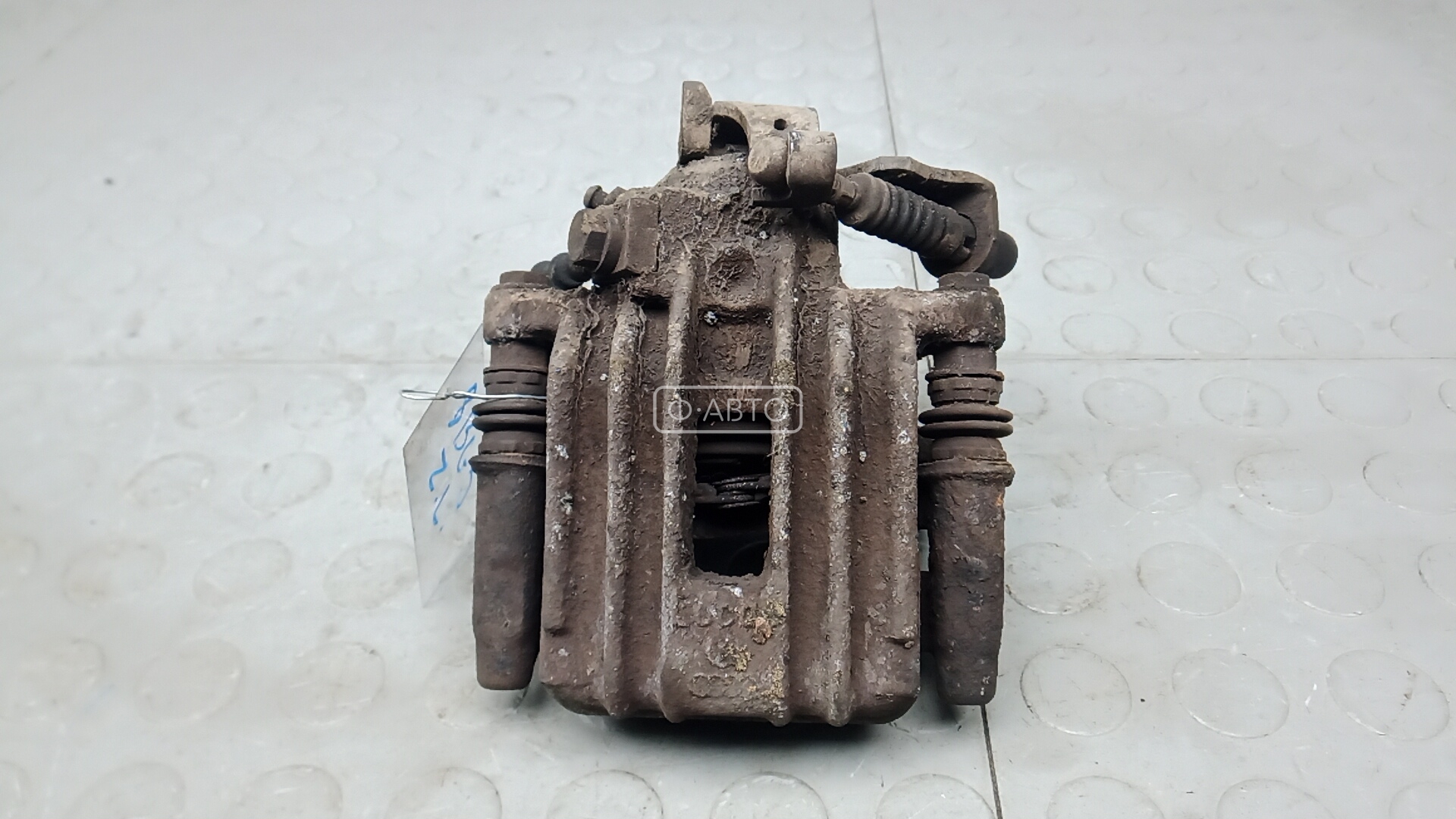 Суппорт тормозной задний левый