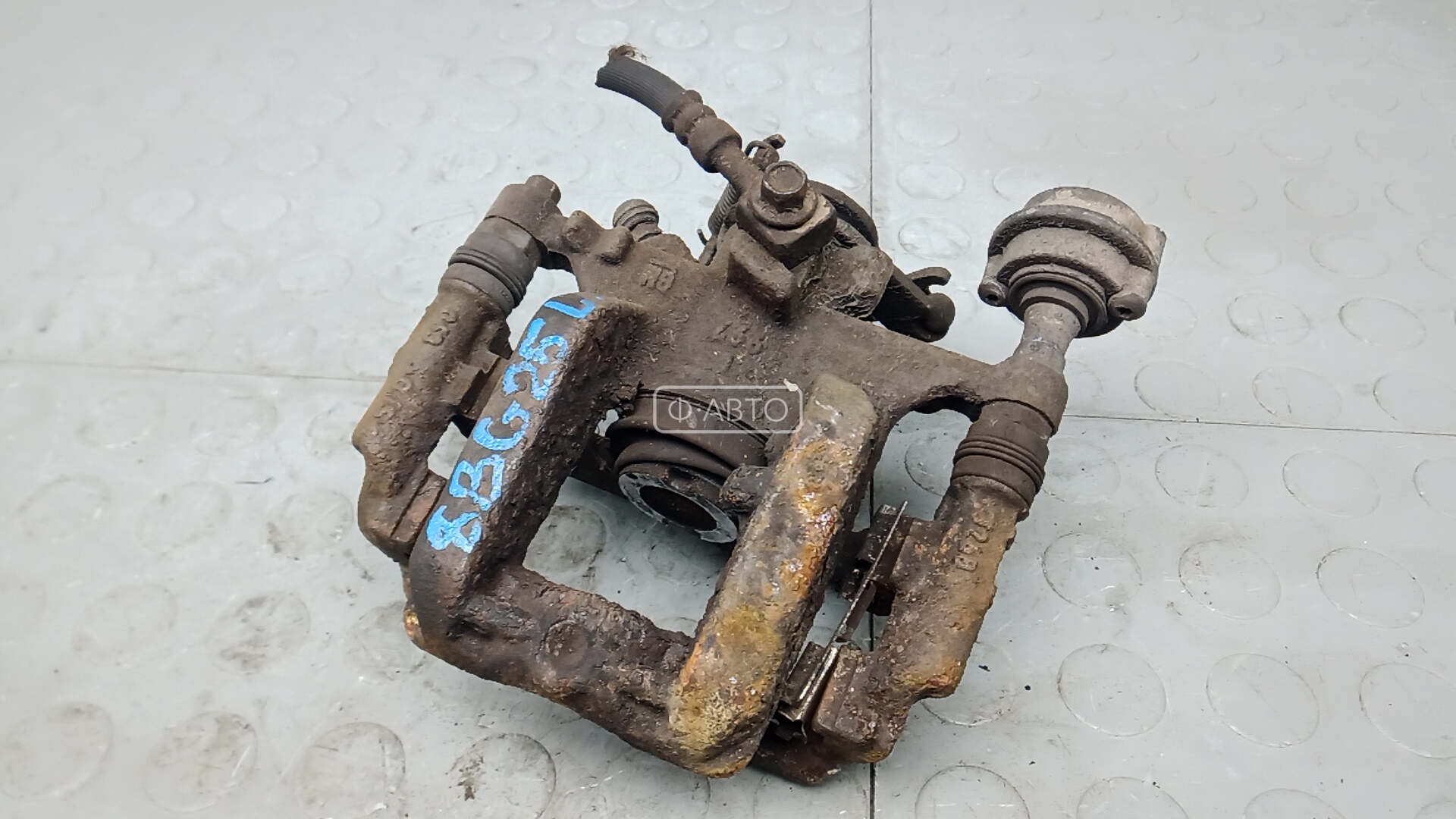 Суппорт тормозной задний левый