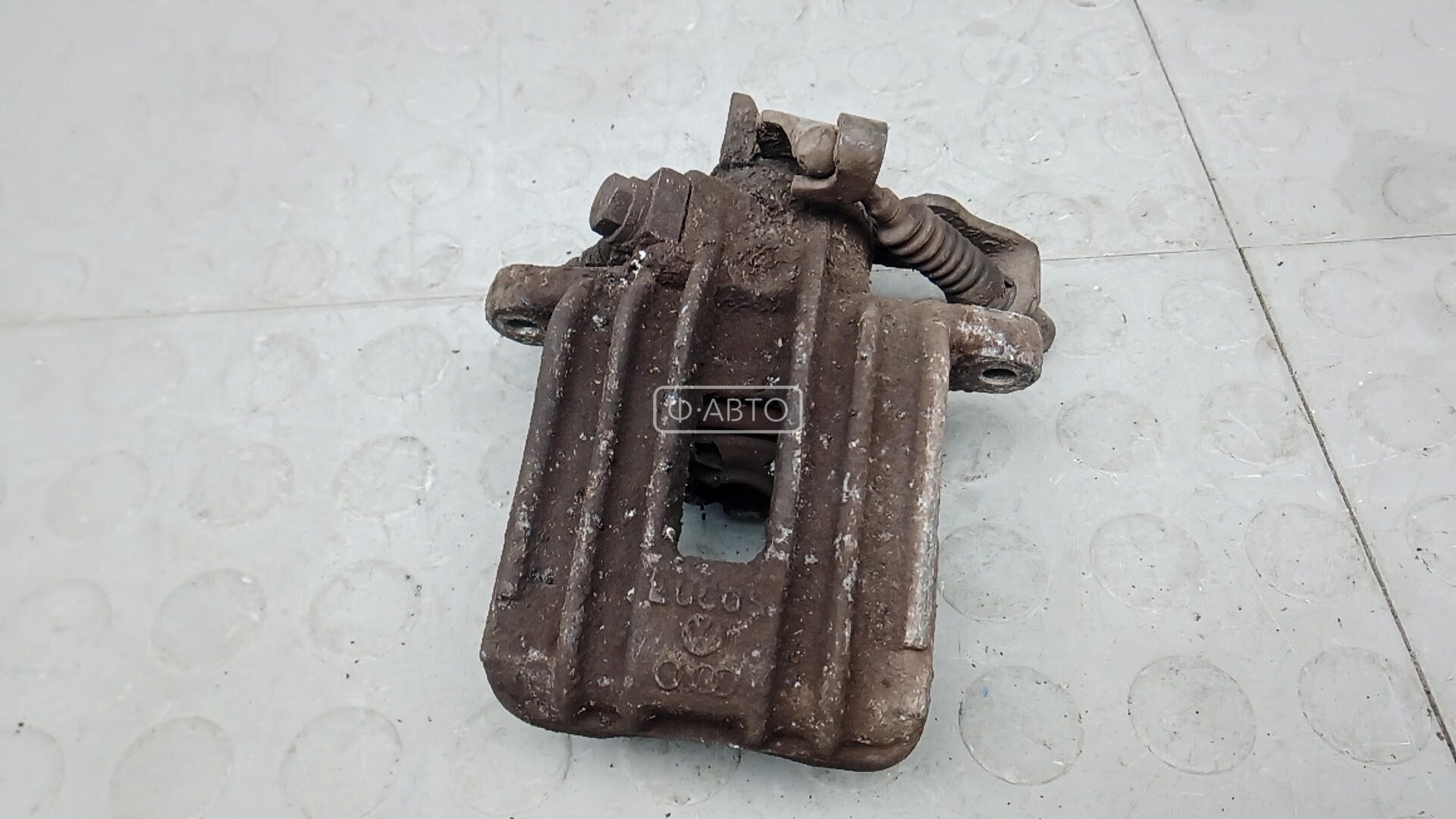 Суппорт тормозной задний левый