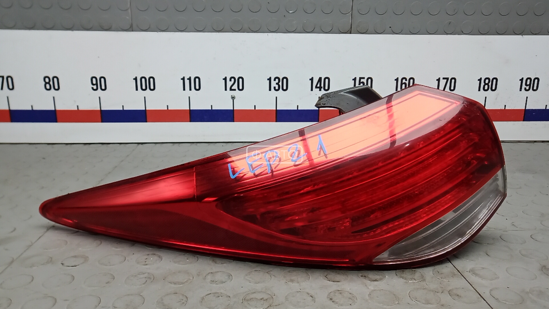 Фонарь задний левый