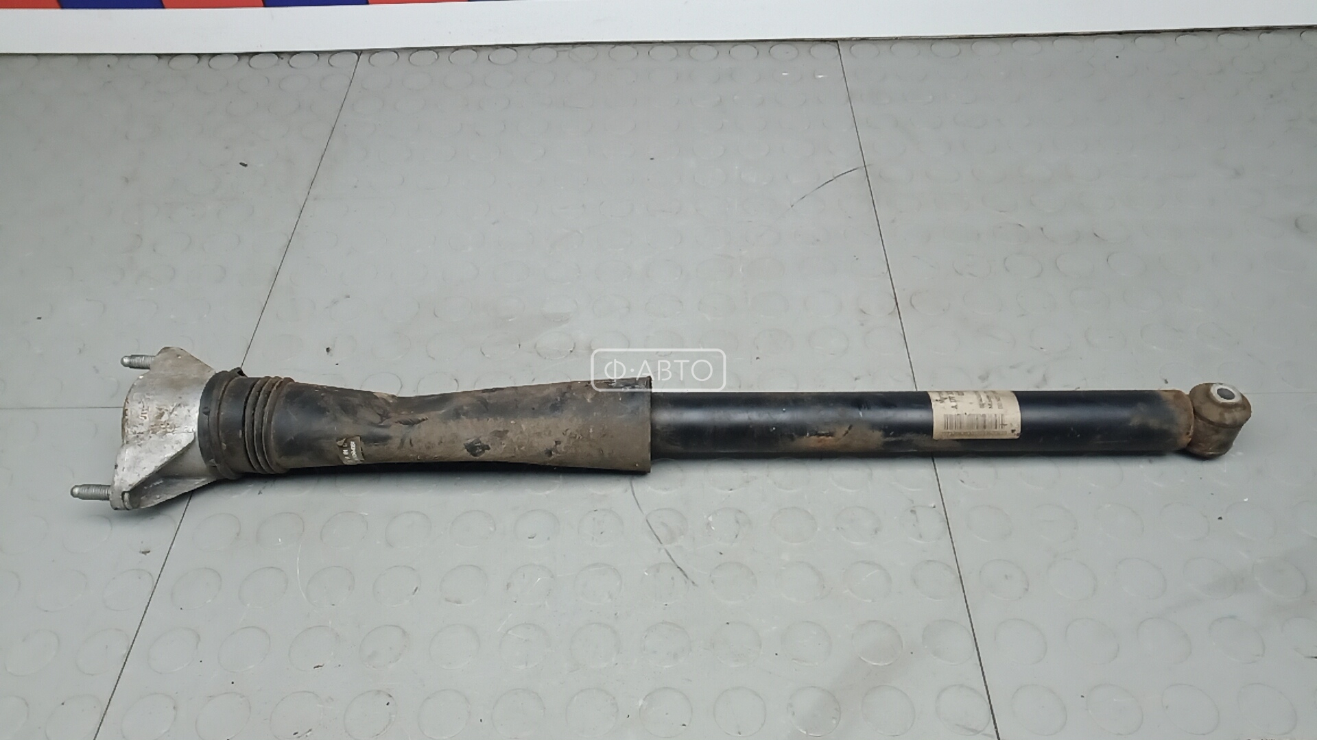 Амортизатор задней балки