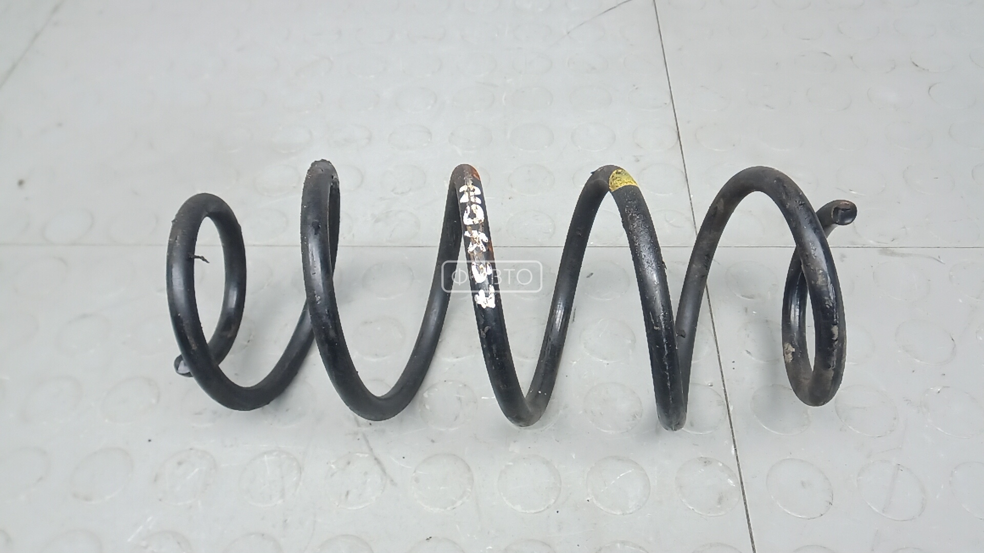 Пружина задняя