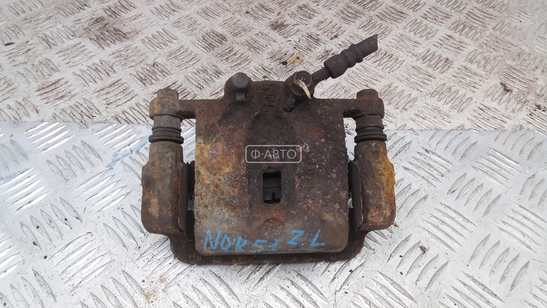 Суппорт тормозной задний левый