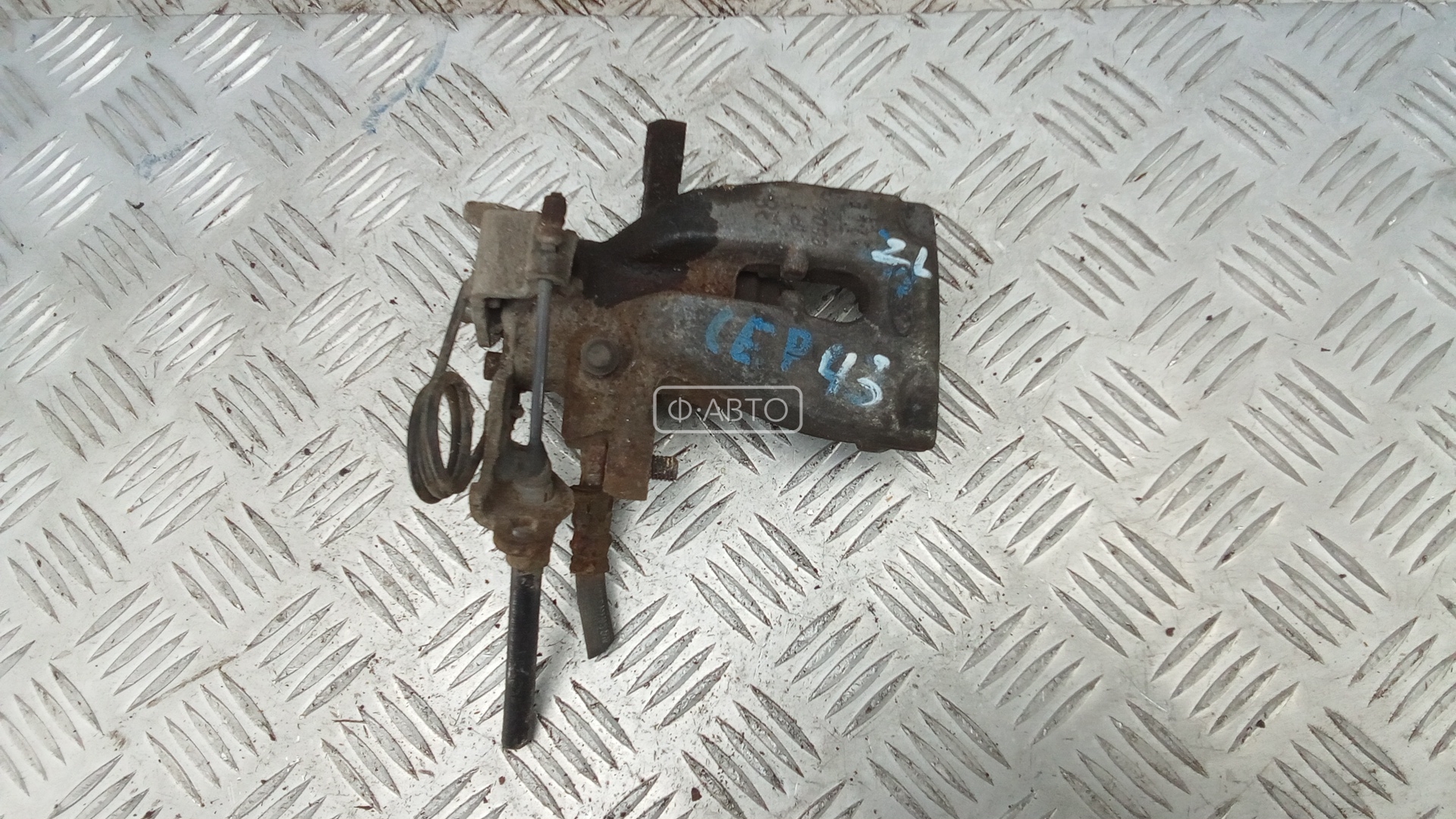 Суппорт тормозной задний левый