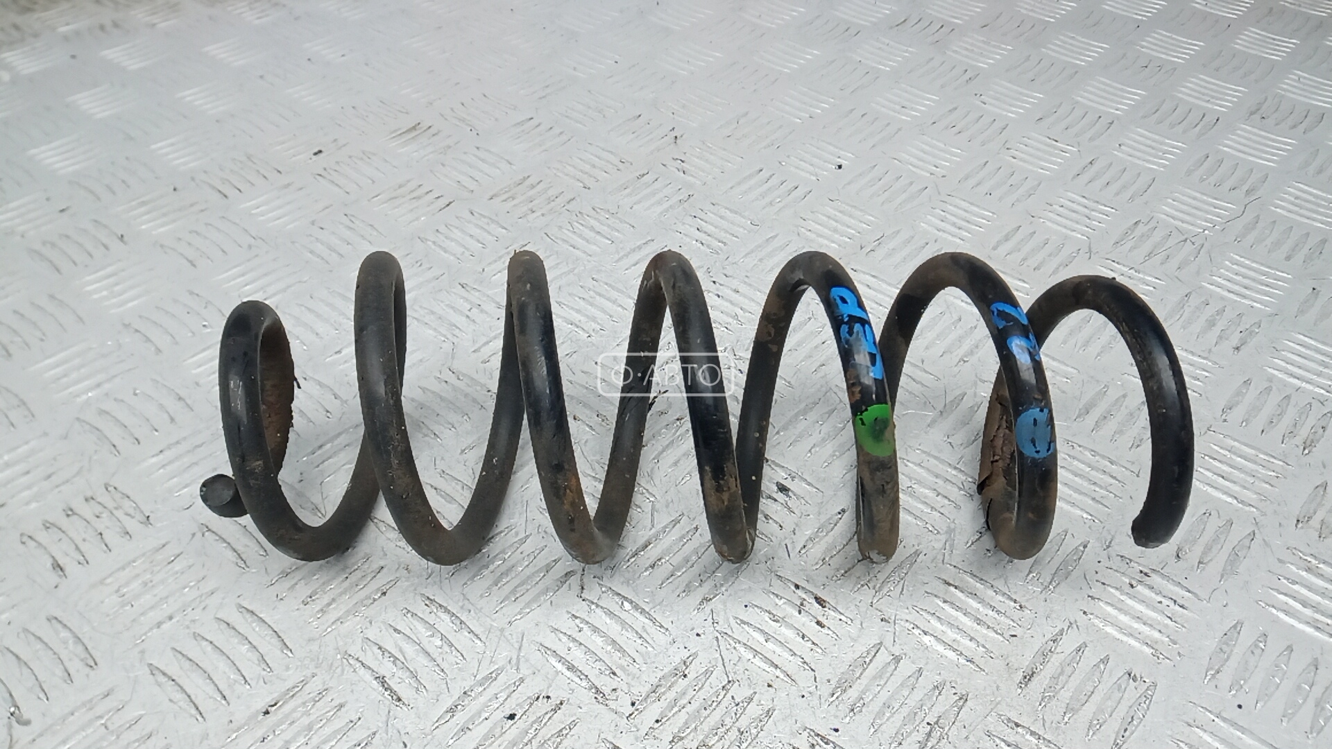 Пружина задняя