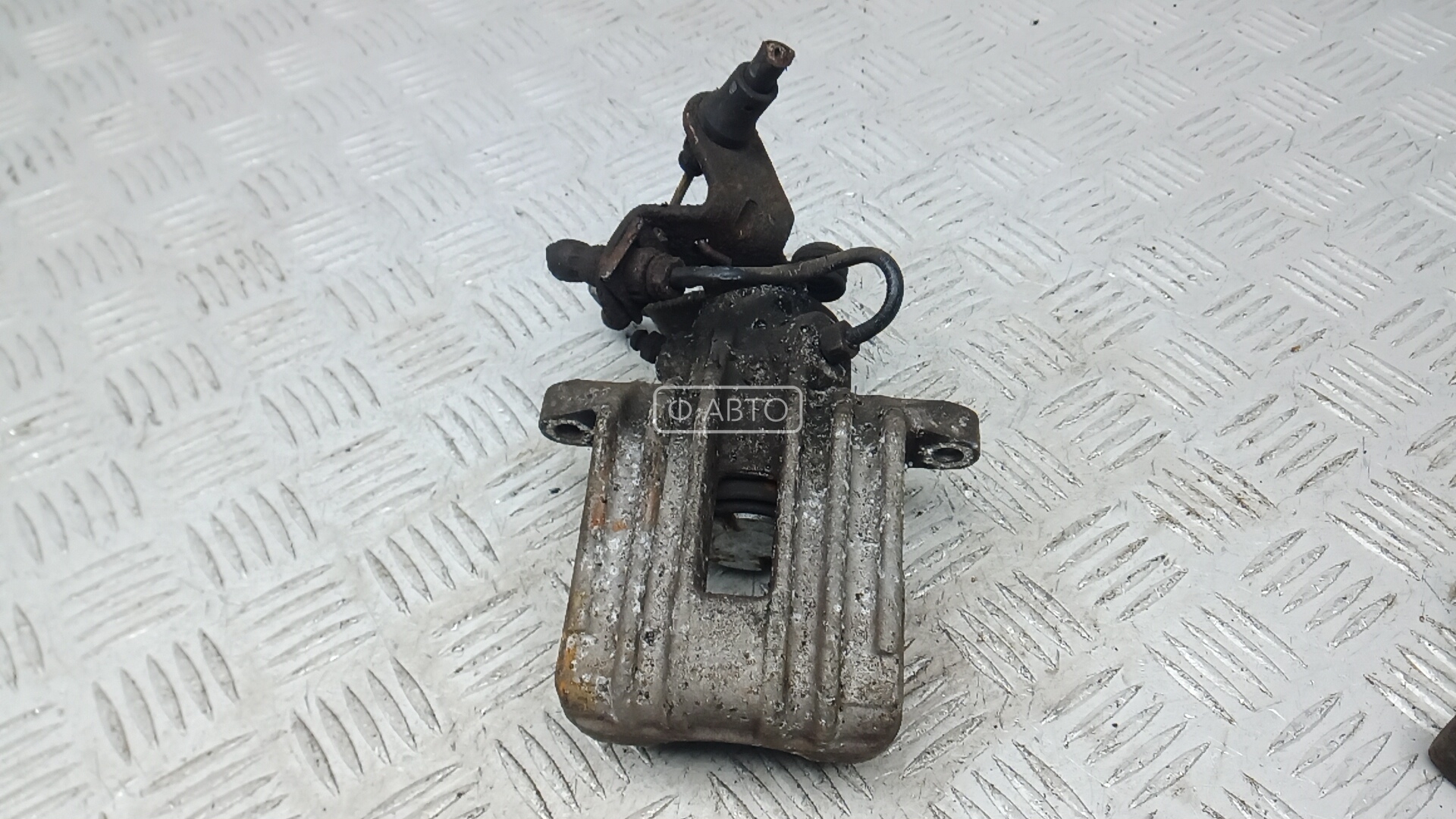 Суппорт тормозной задний правый