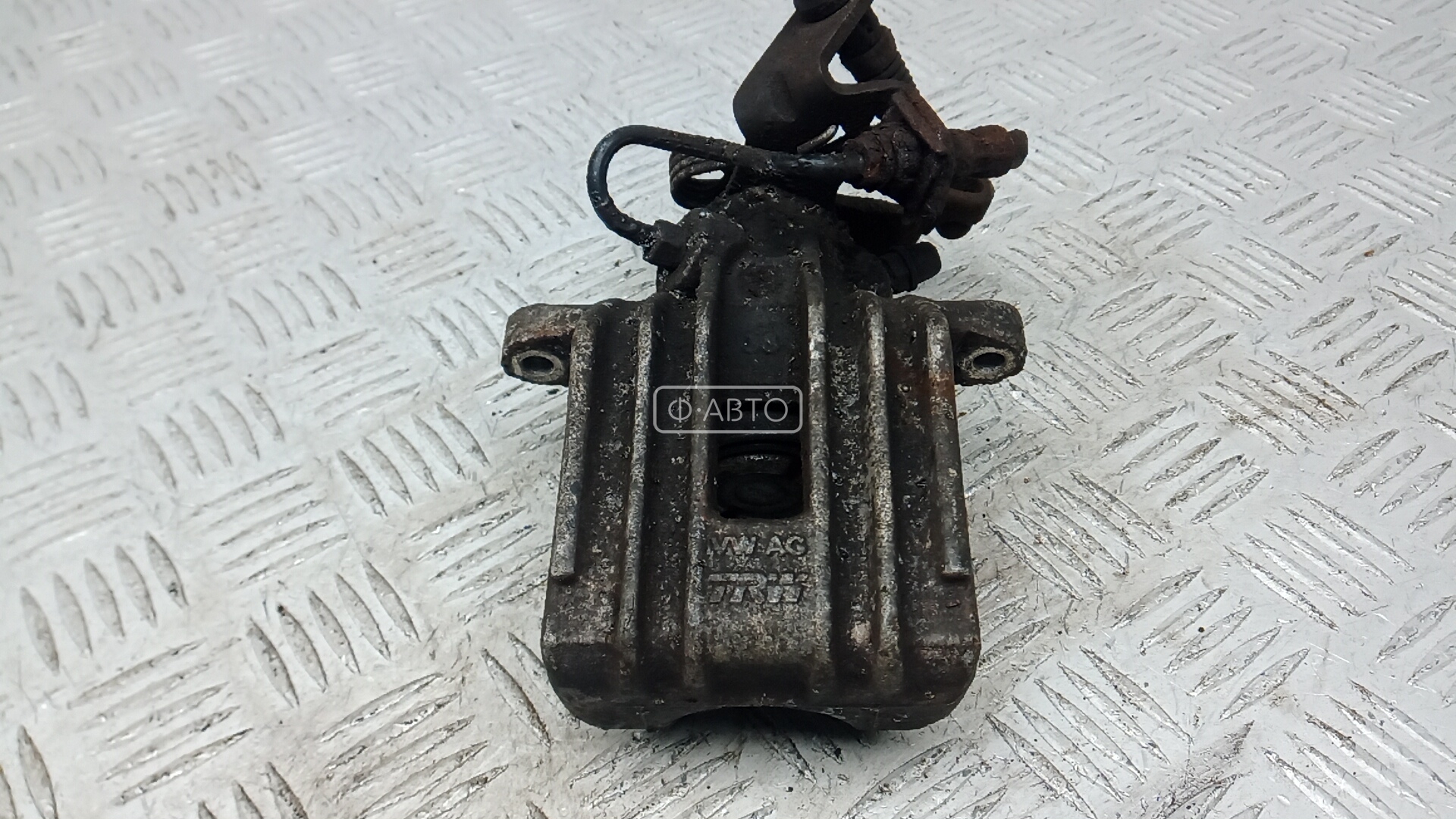 Суппорт тормозной задний левый
