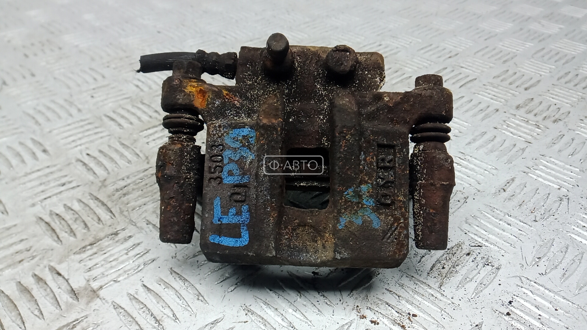 Суппорт тормозной задний левый