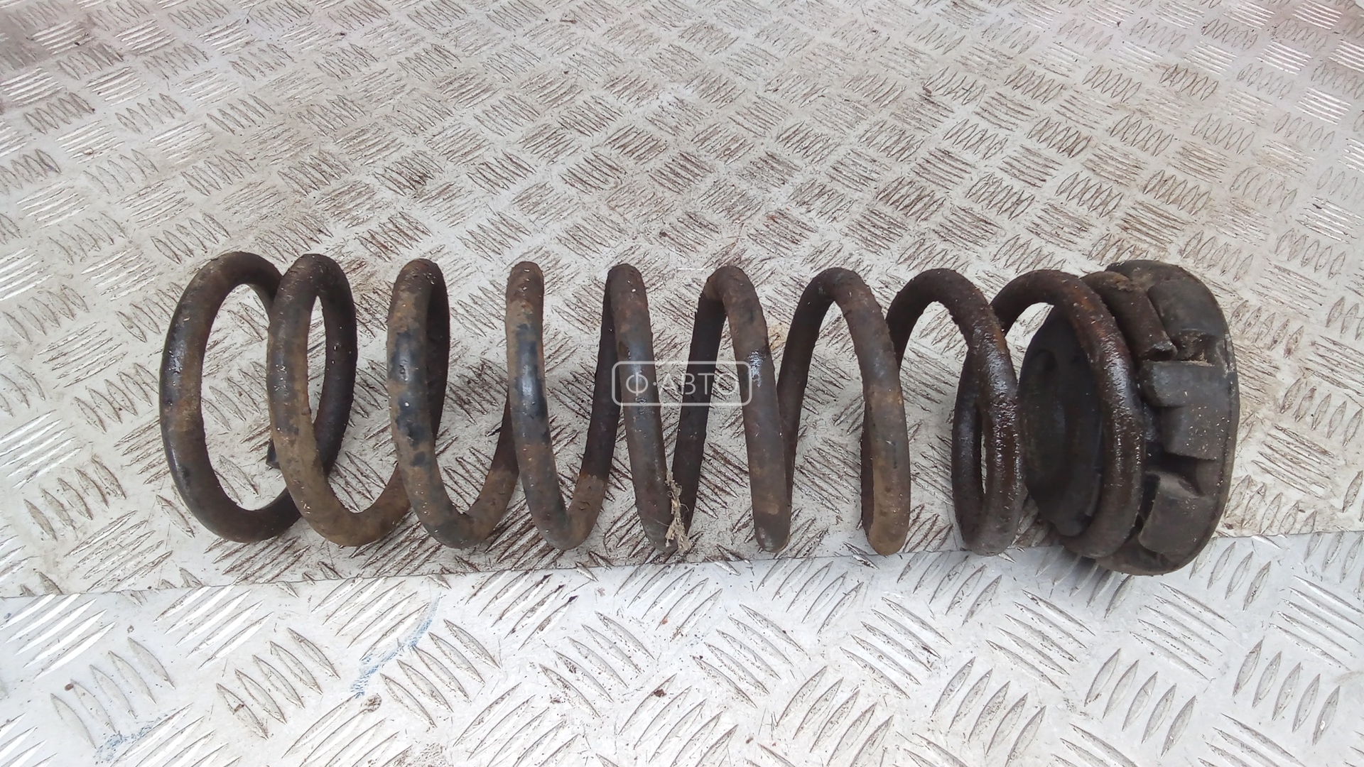 Пружина задняя