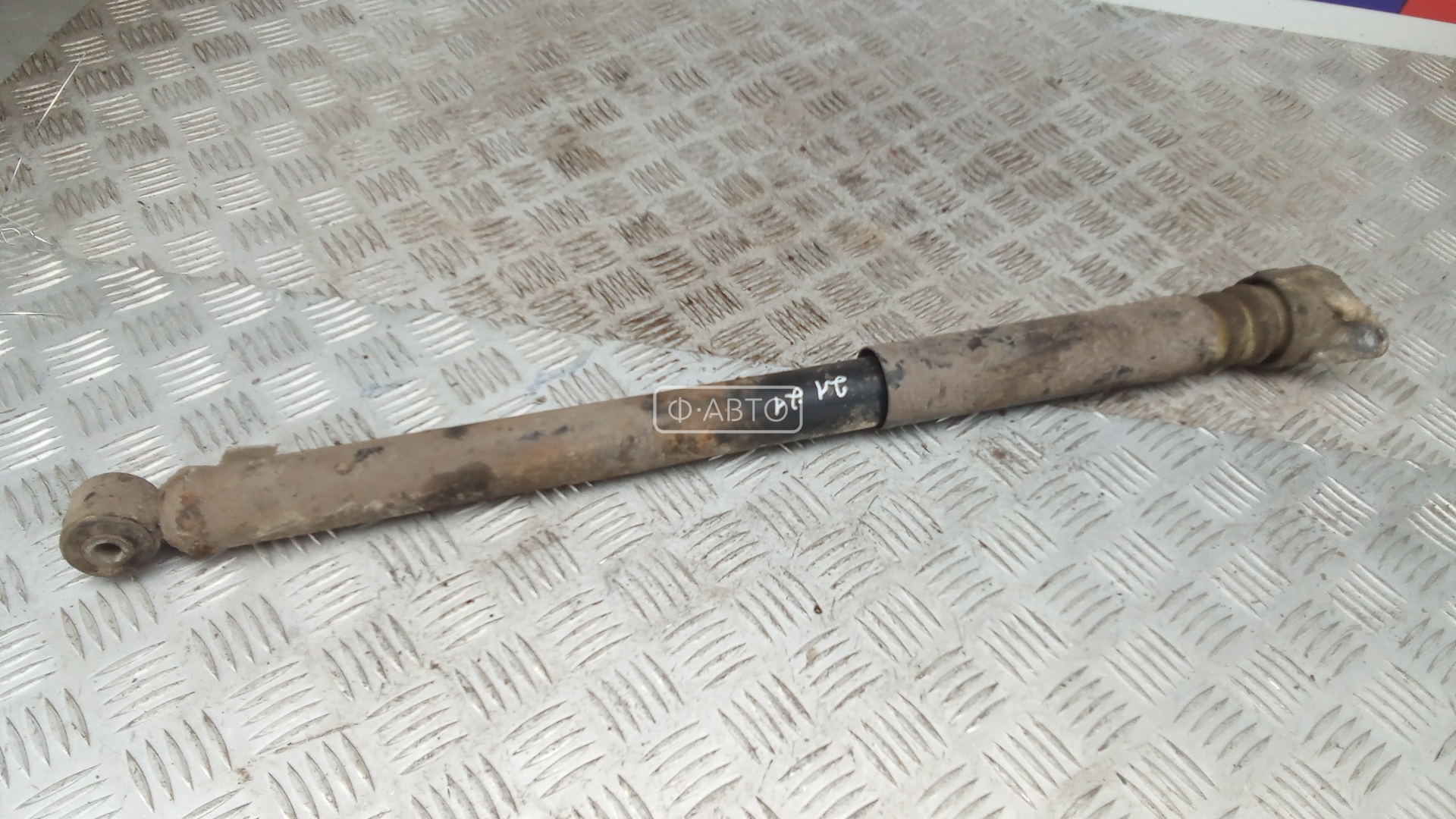 Амортизатор задней балки