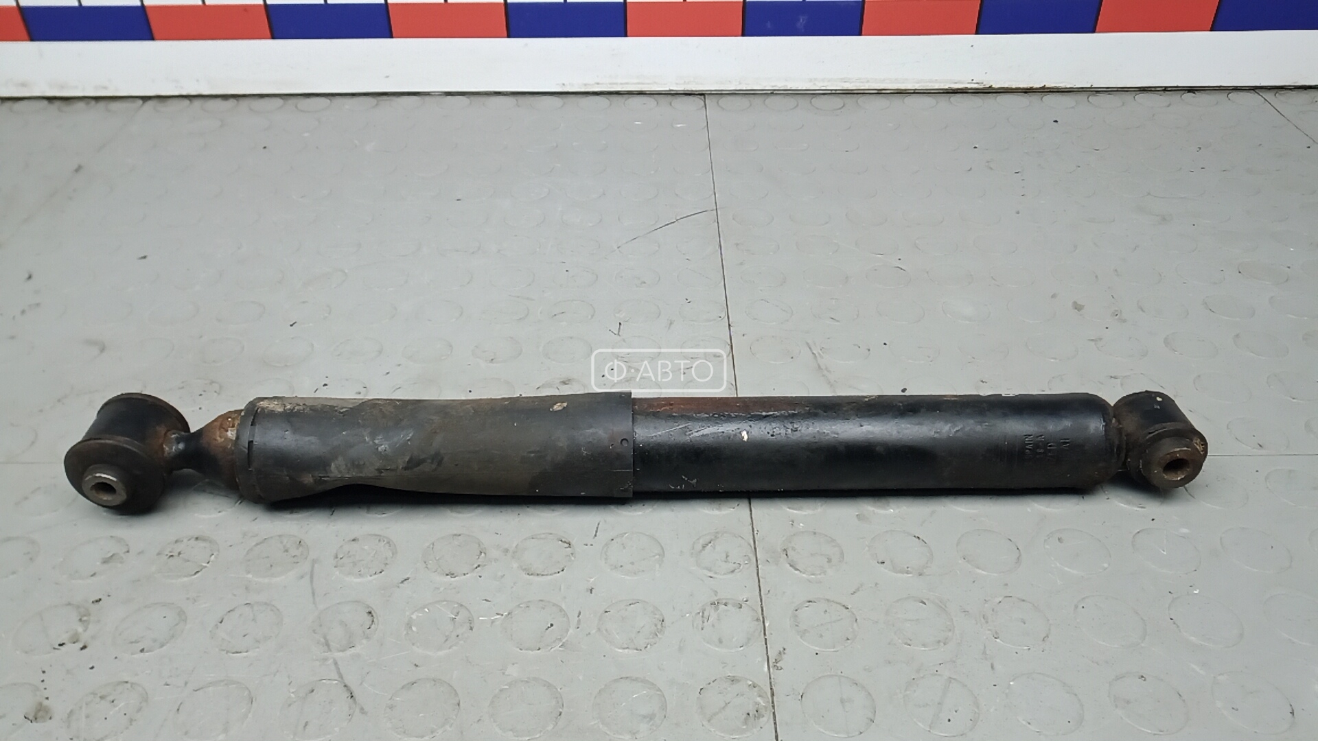 Амортизатор задней балки