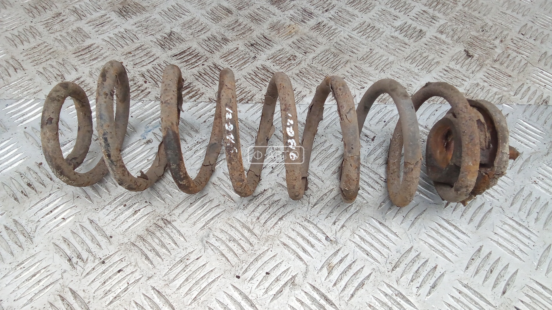 Пружина задняя