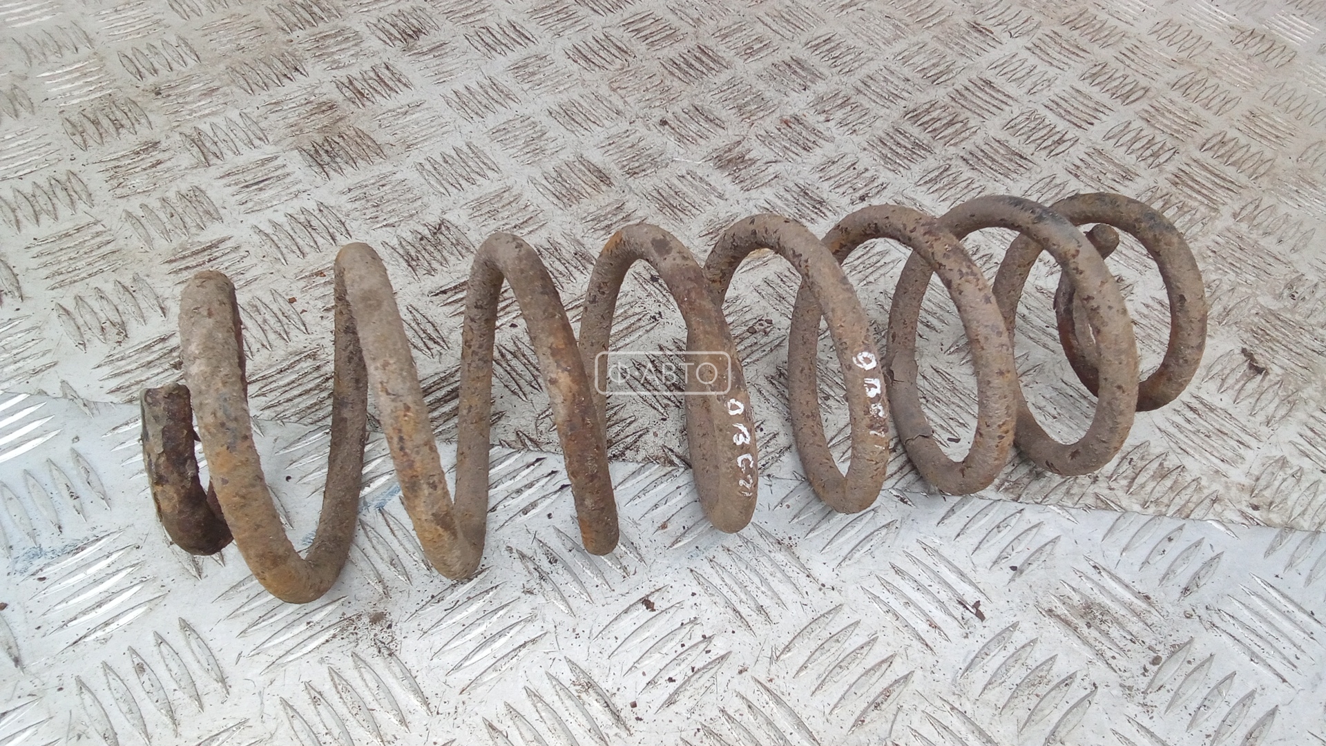 Пружина задняя