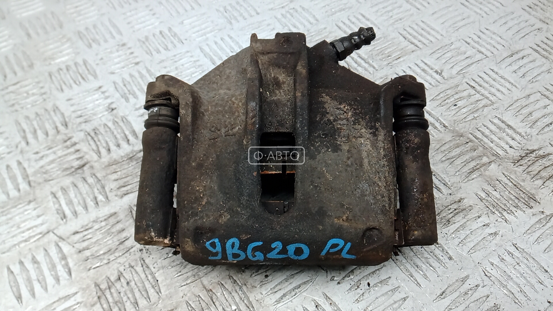 Суппорт тормозной передний левый