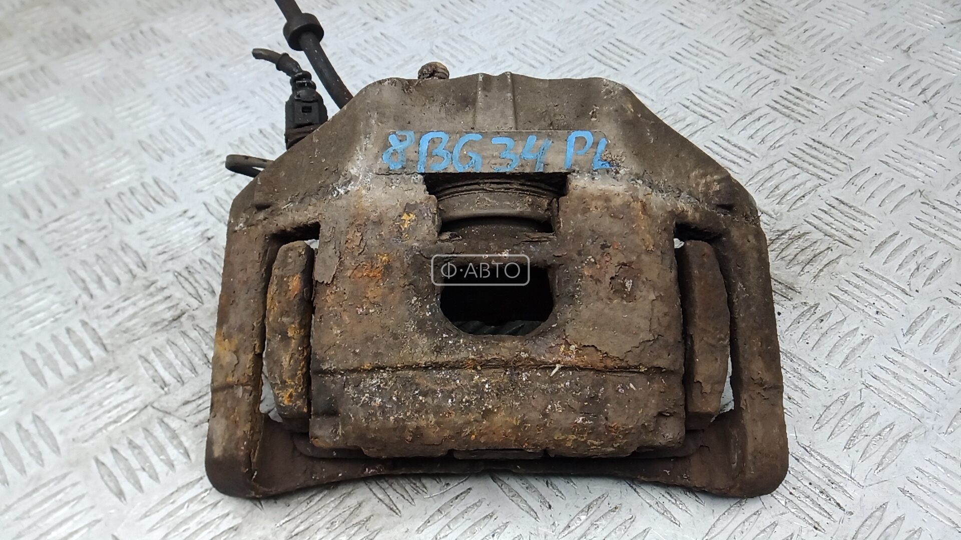 Суппорт тормозной передний левый