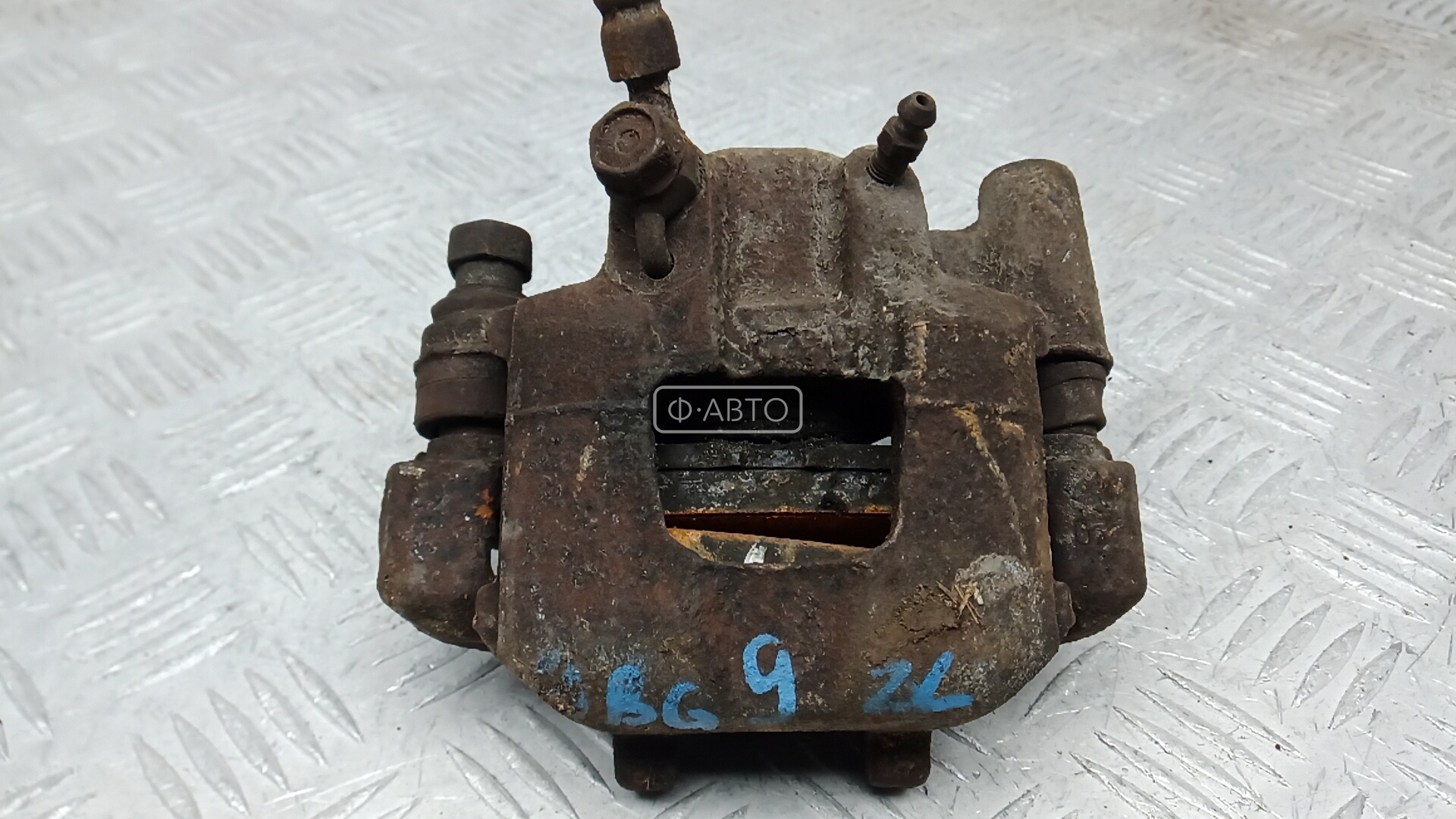 Суппорт тормозной задний левый