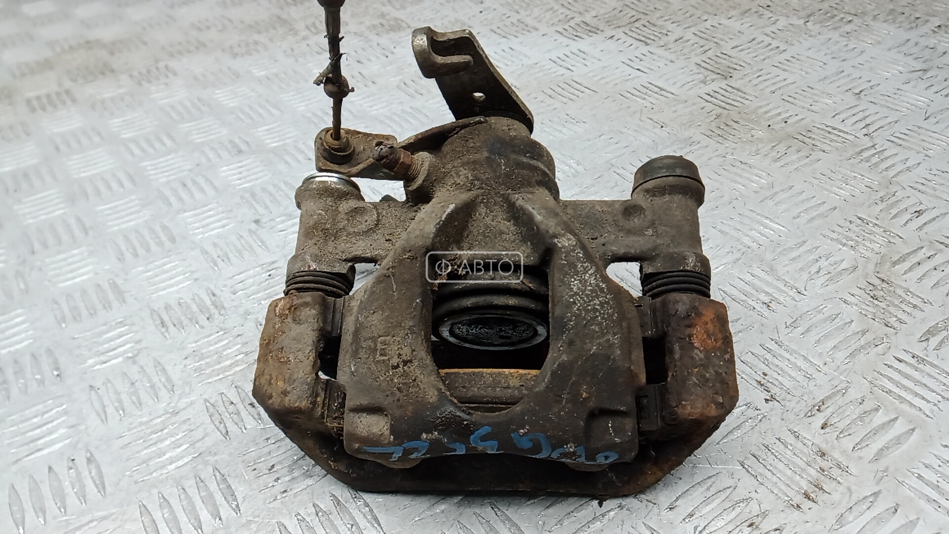 Суппорт тормозной задний левый