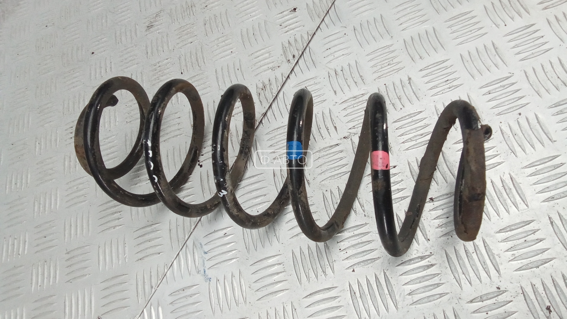 Пружина задняя