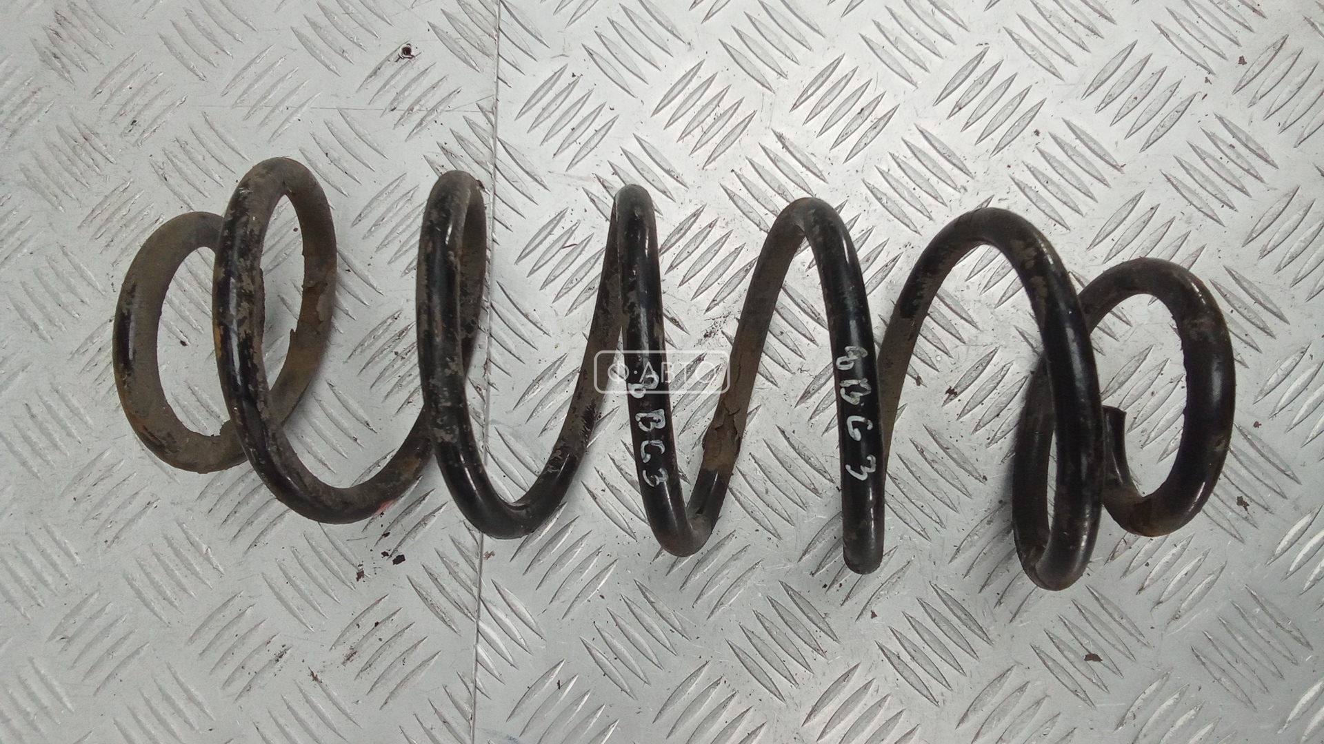 Пружина задняя