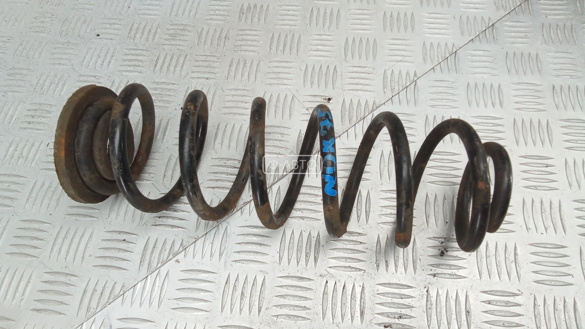 Пружина задняя