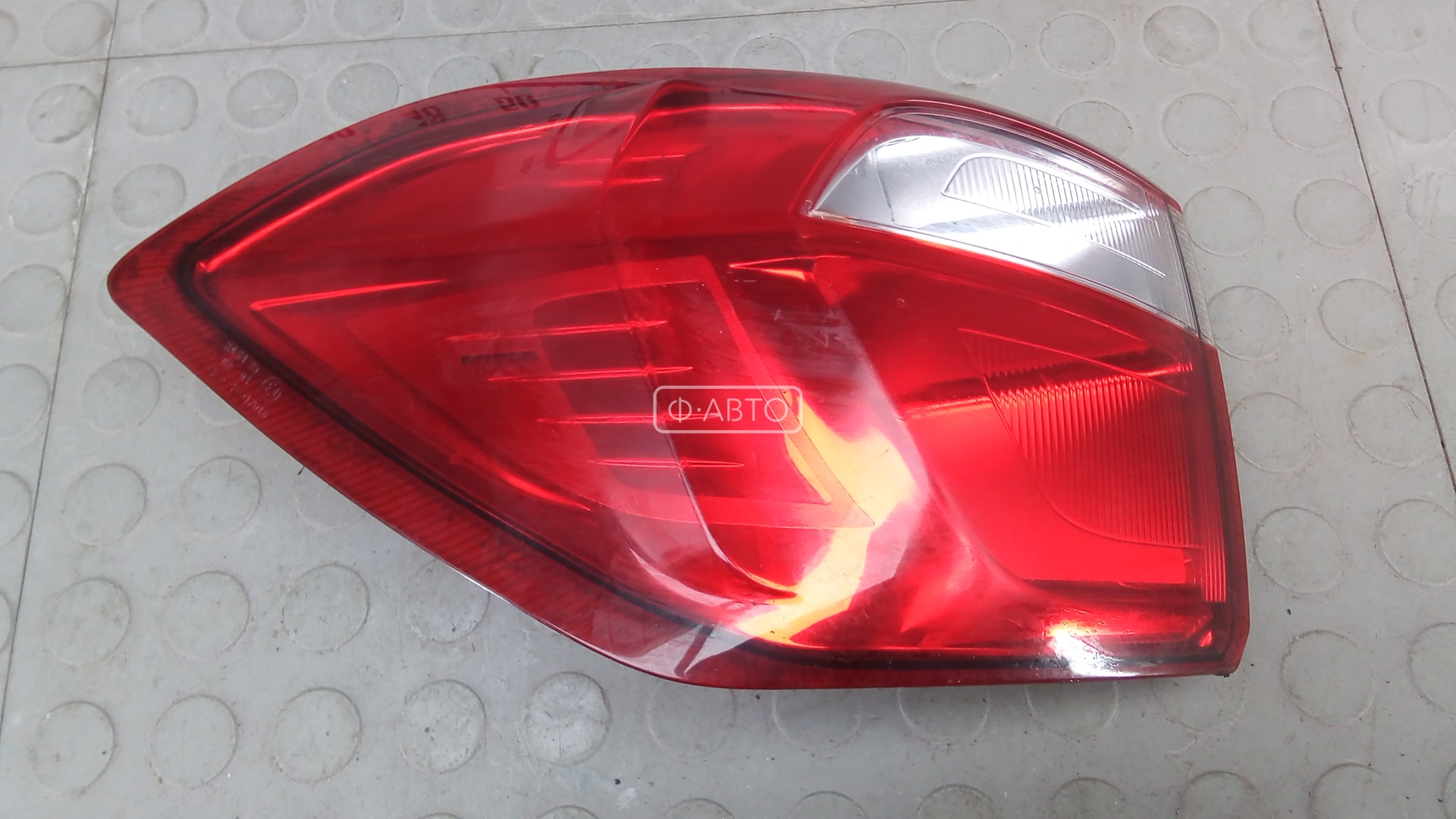 Фонарь задний левый