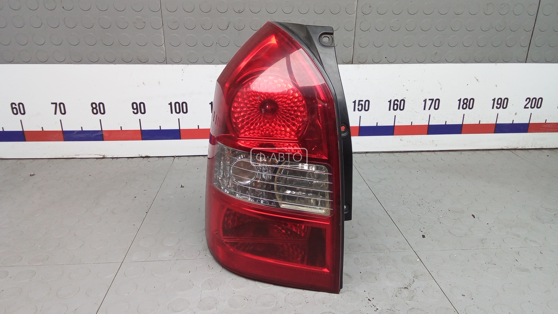 Фонарь задний левый