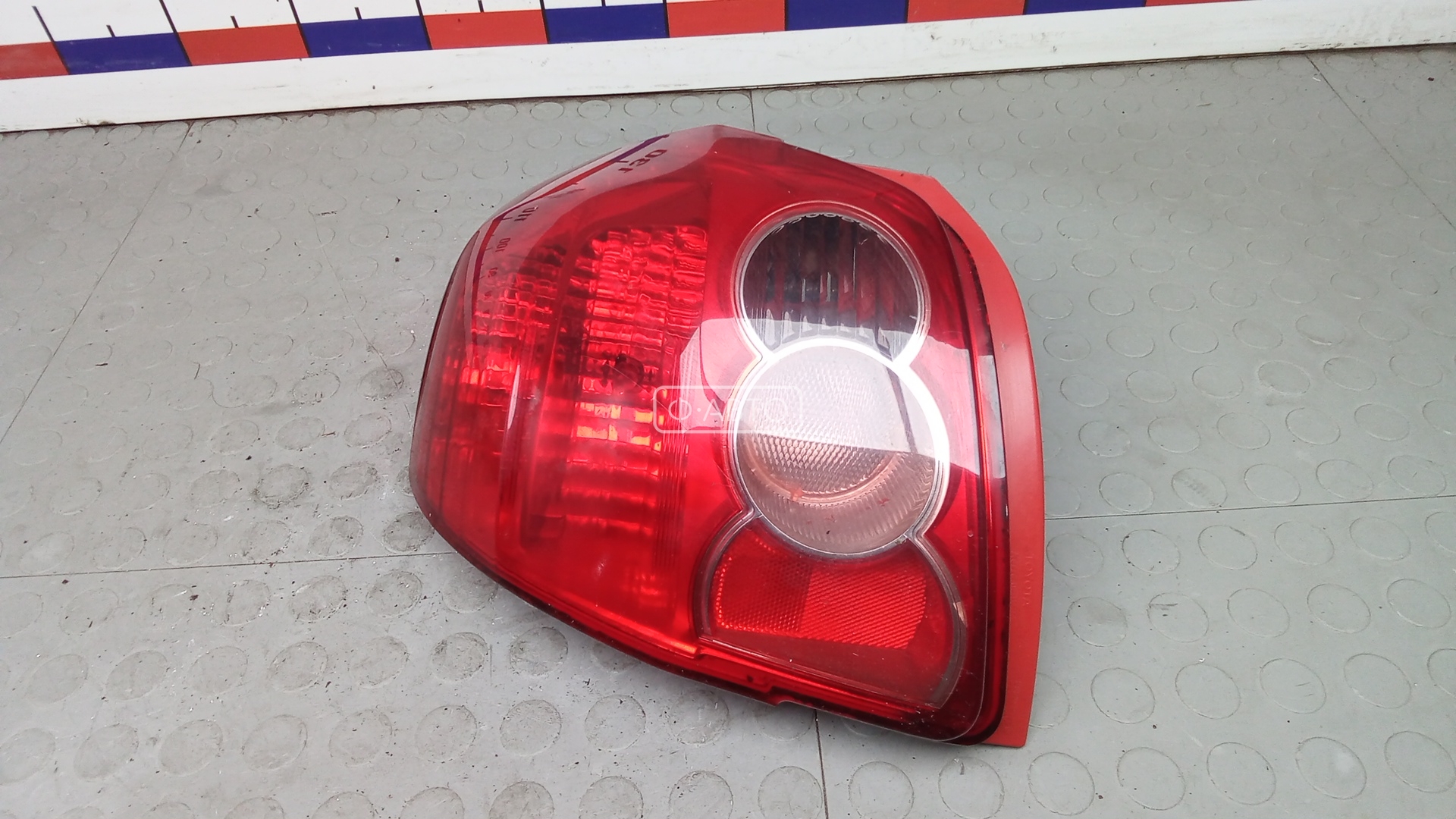 Фонарь задний левый