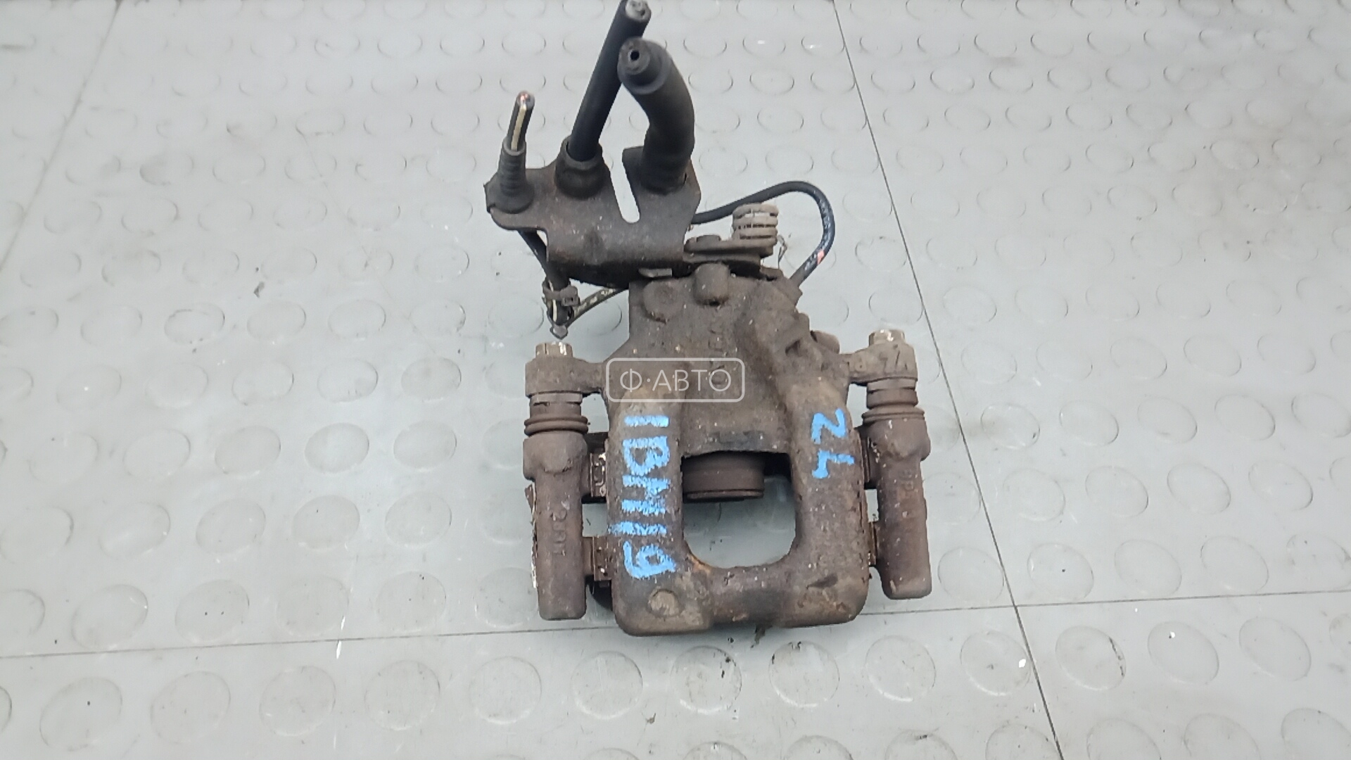 Суппорт тормозной задний левый