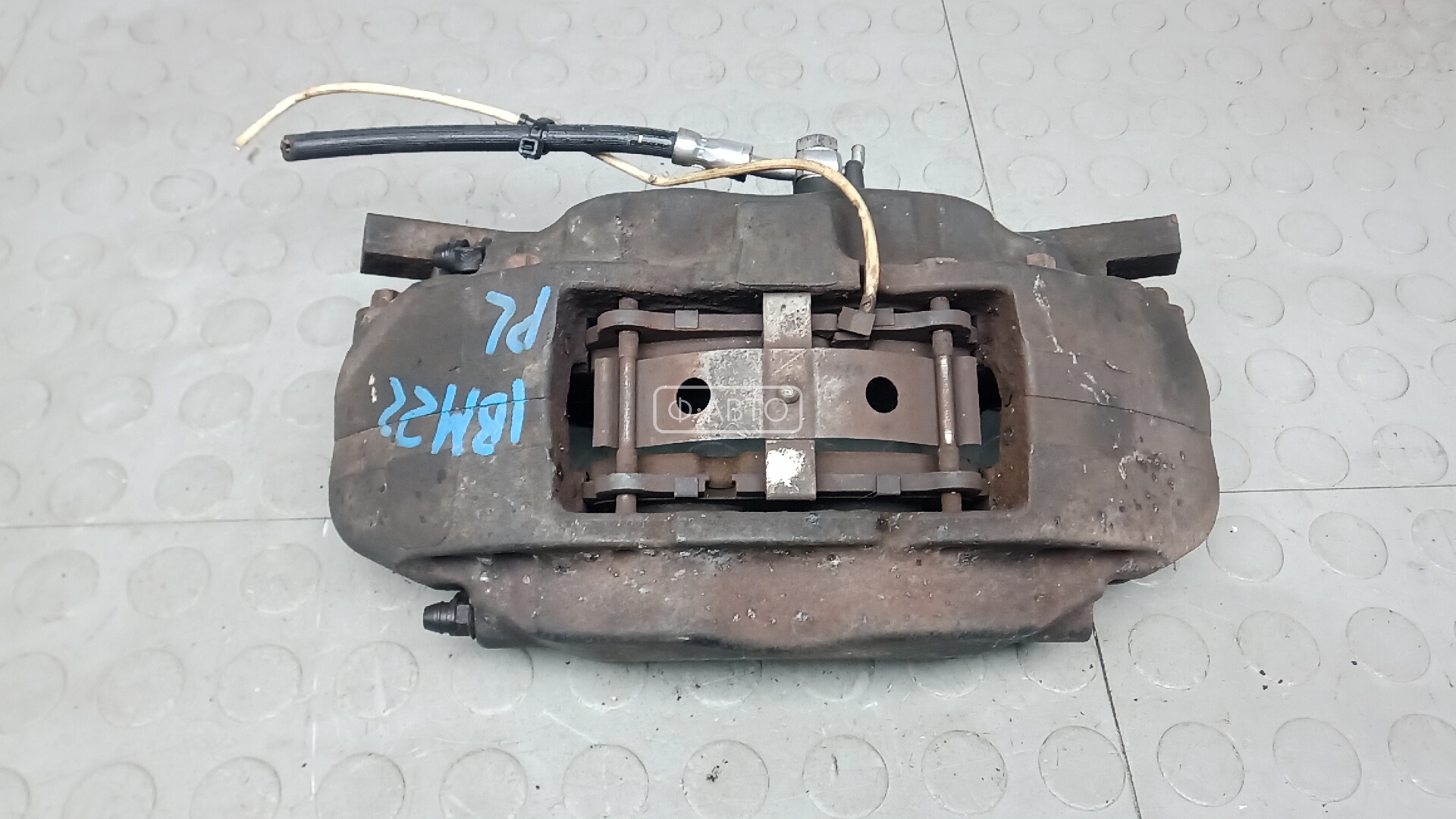 Суппорт тормозной передний левый