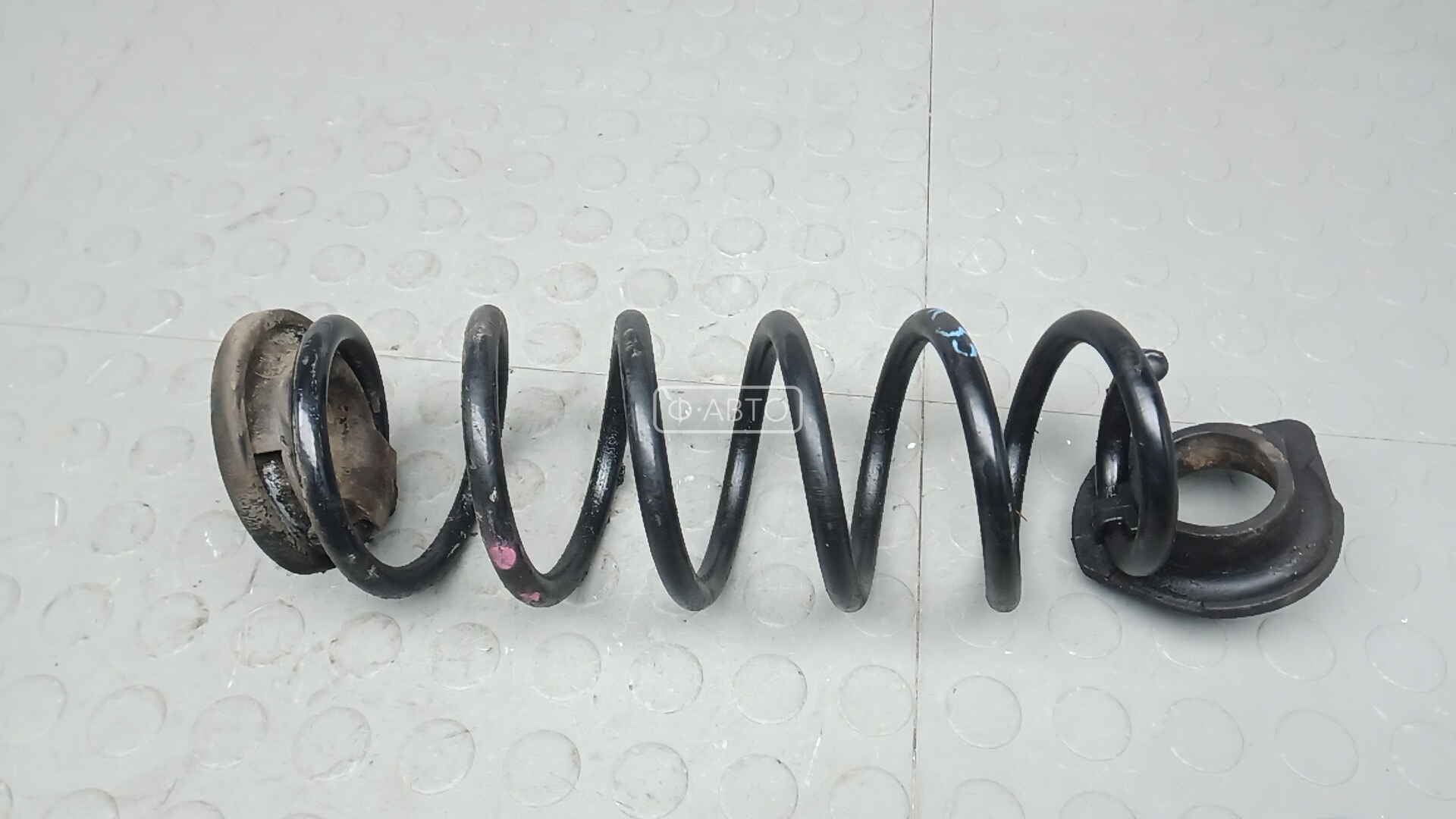 Пружина задняя