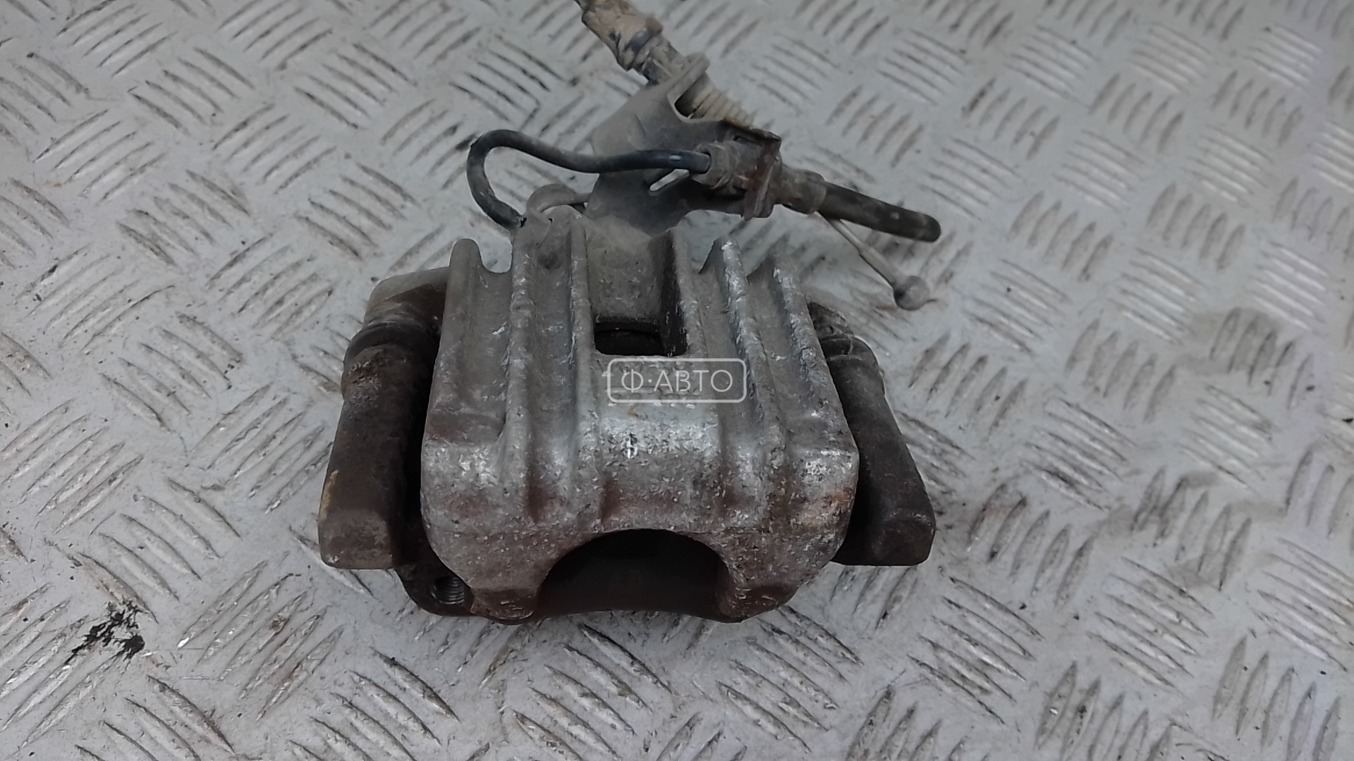 Суппорт тормозной задний левый