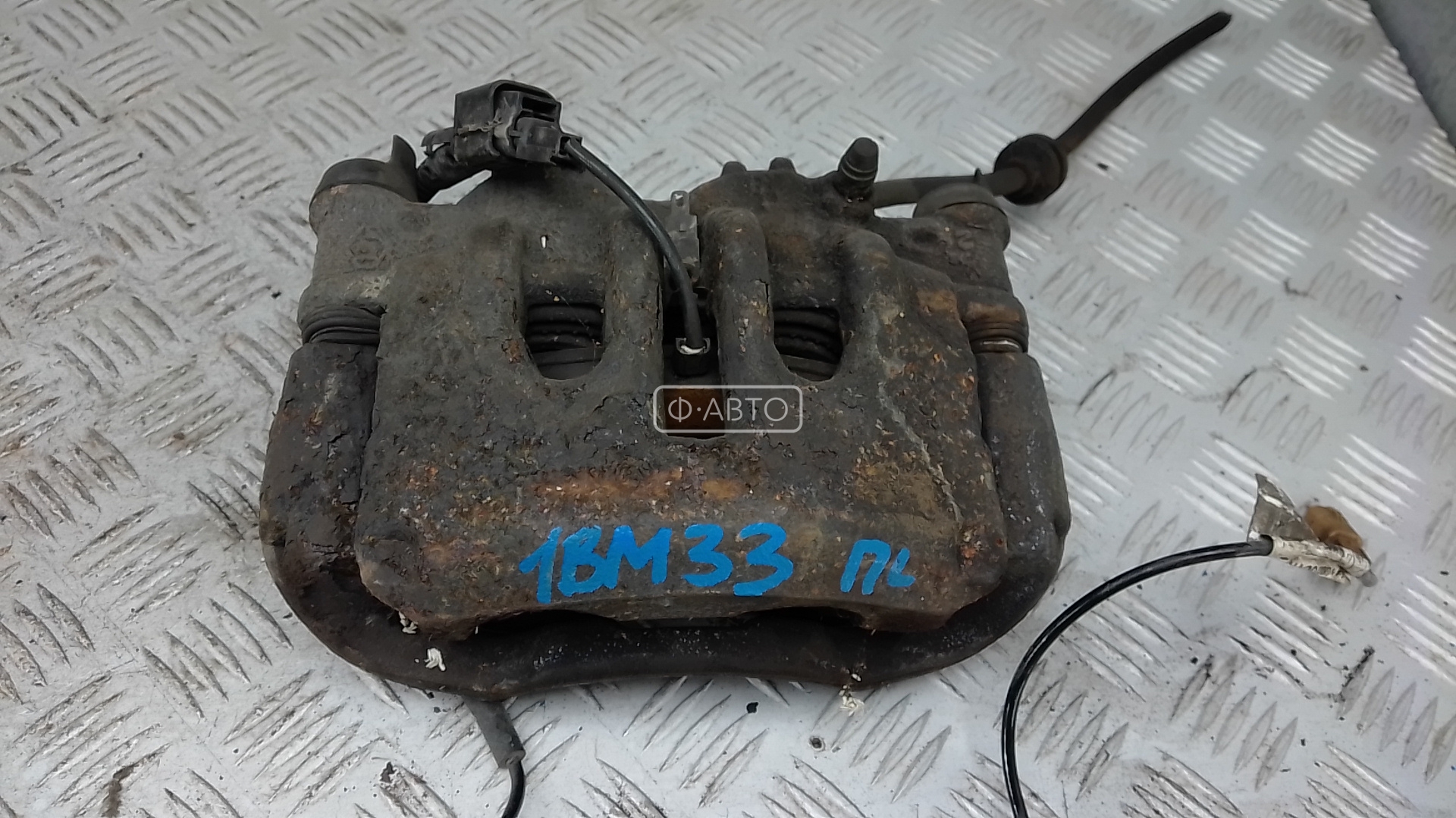 Суппорт тормозной передний левый