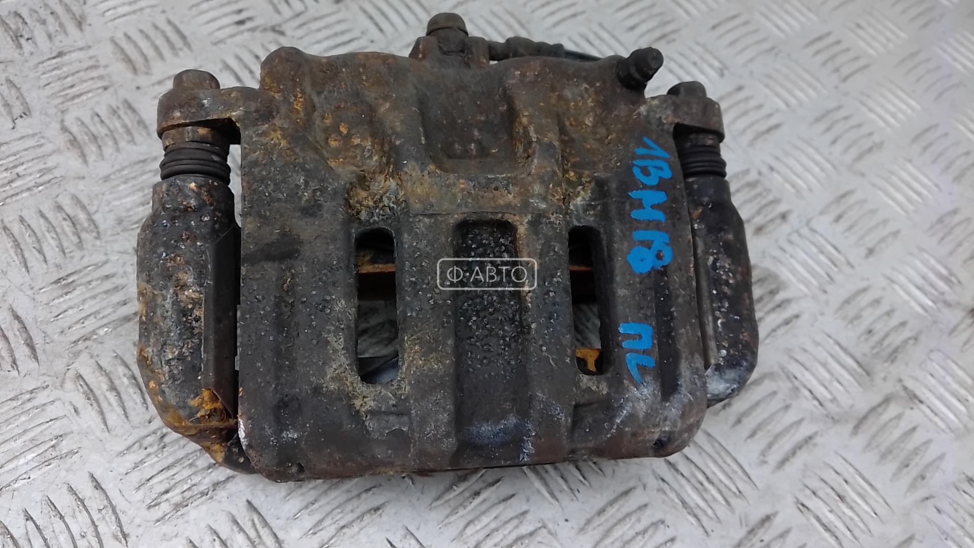Суппорт тормозной передний левый