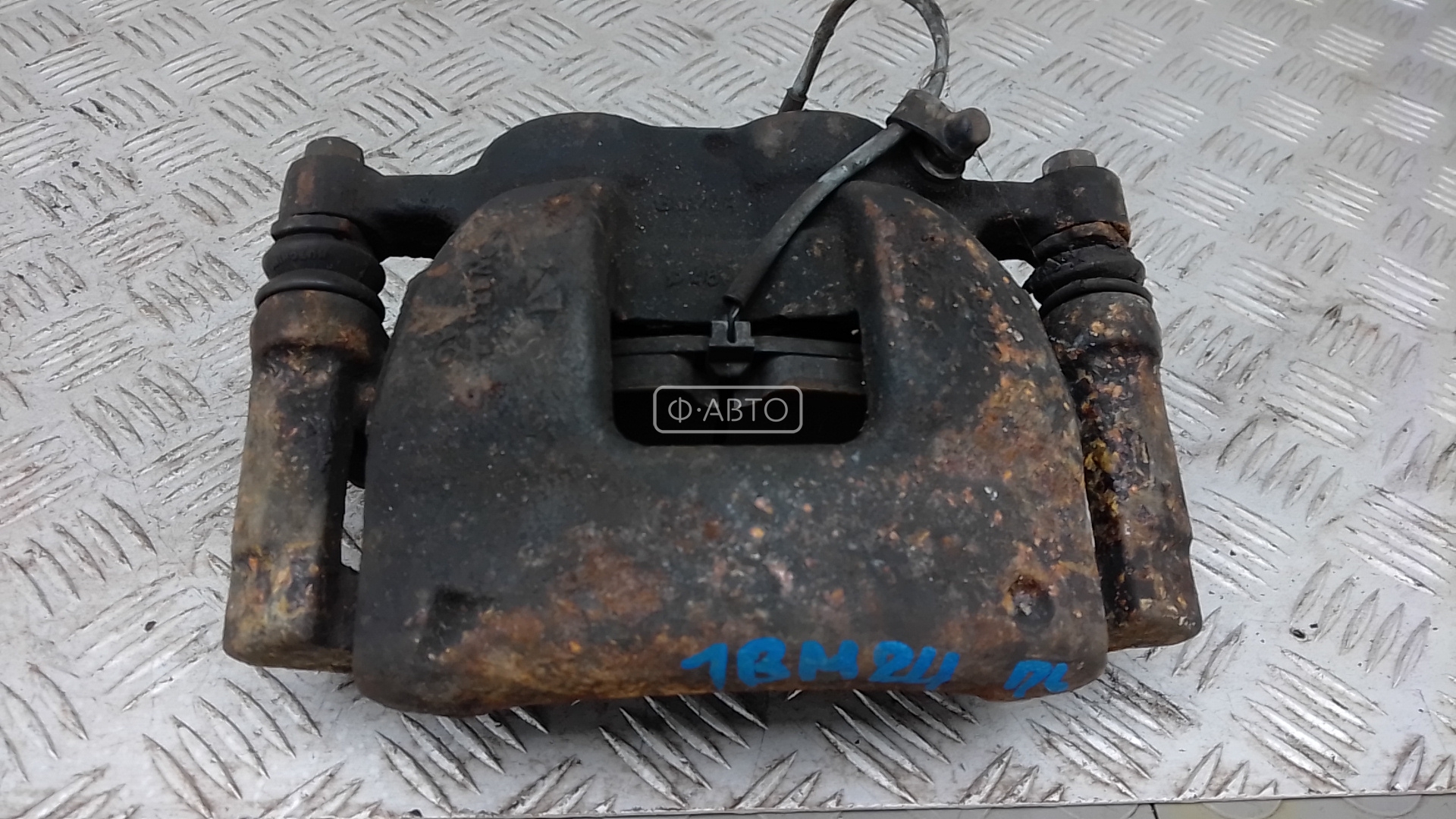 Суппорт тормозной передний левый