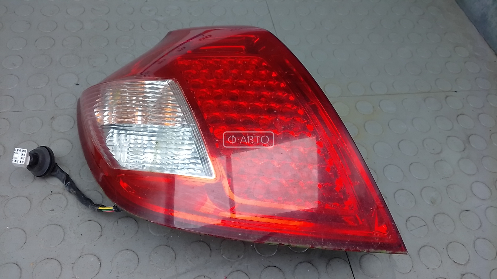 Фонарь задний левый