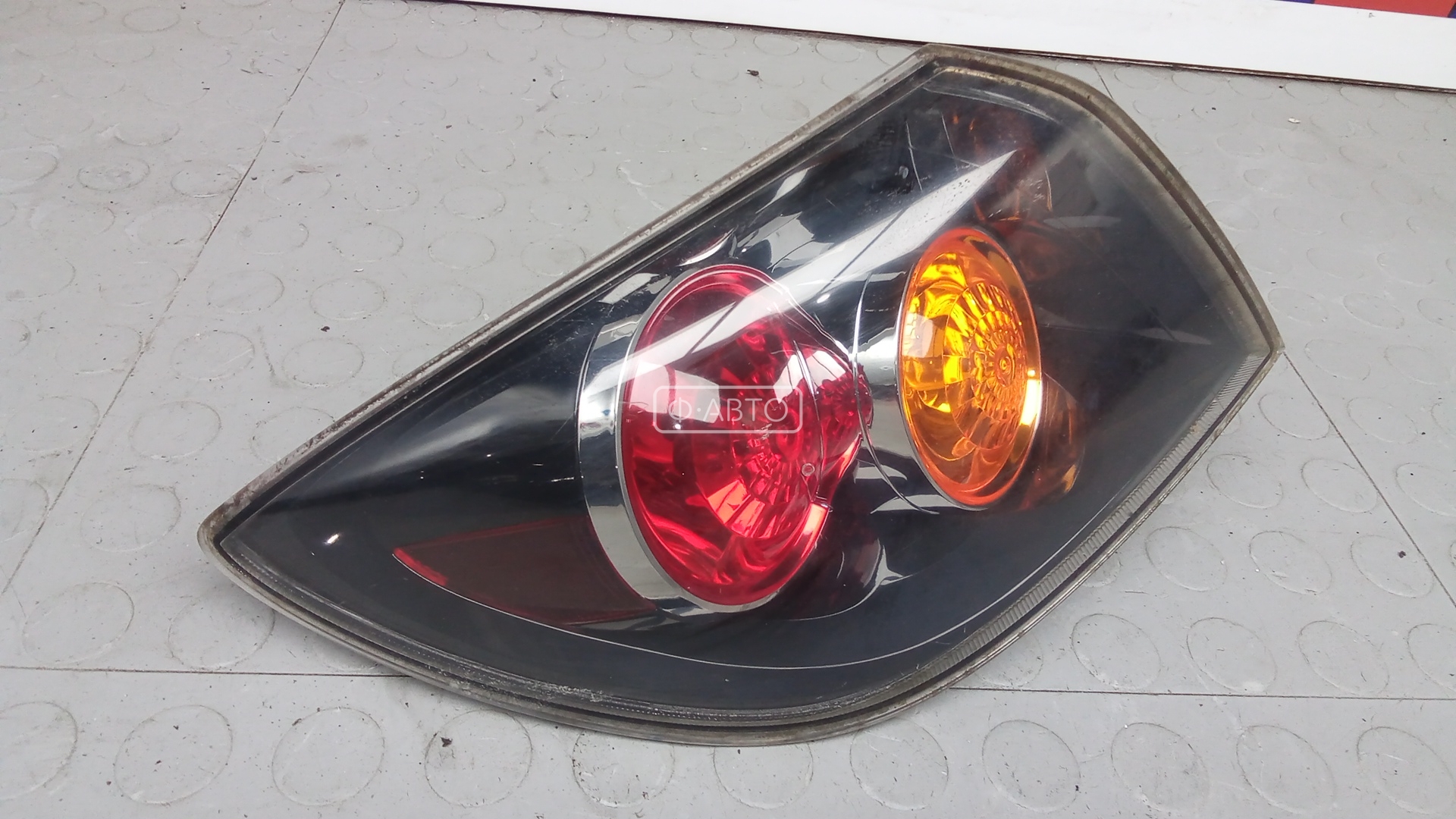 Фонарь задний левый