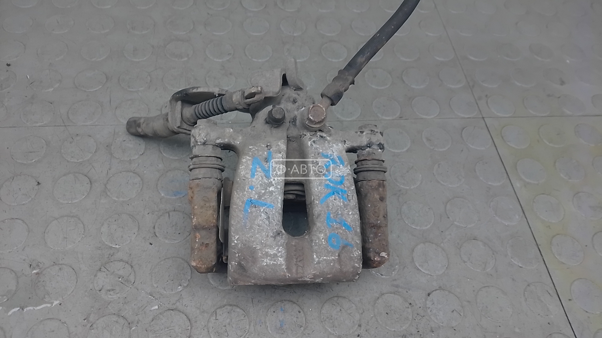 Суппорт тормозной задний левый