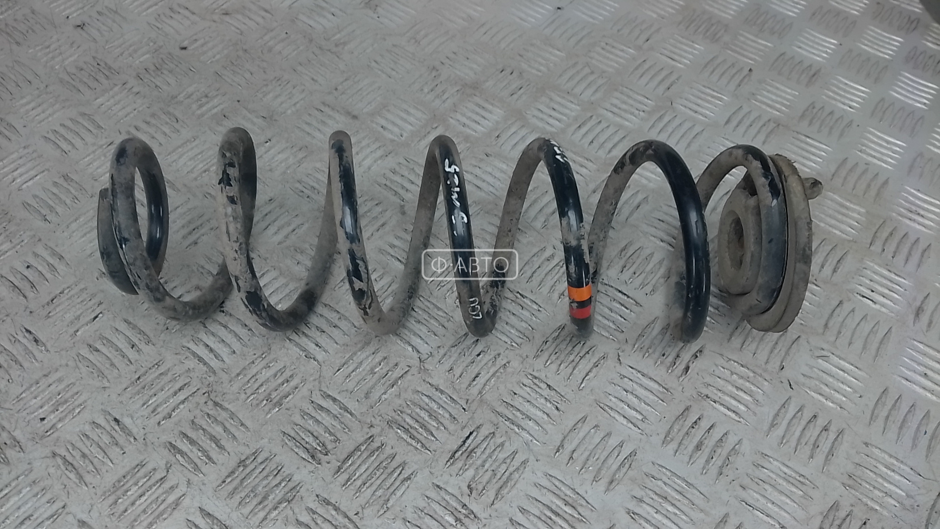 Пружина задняя