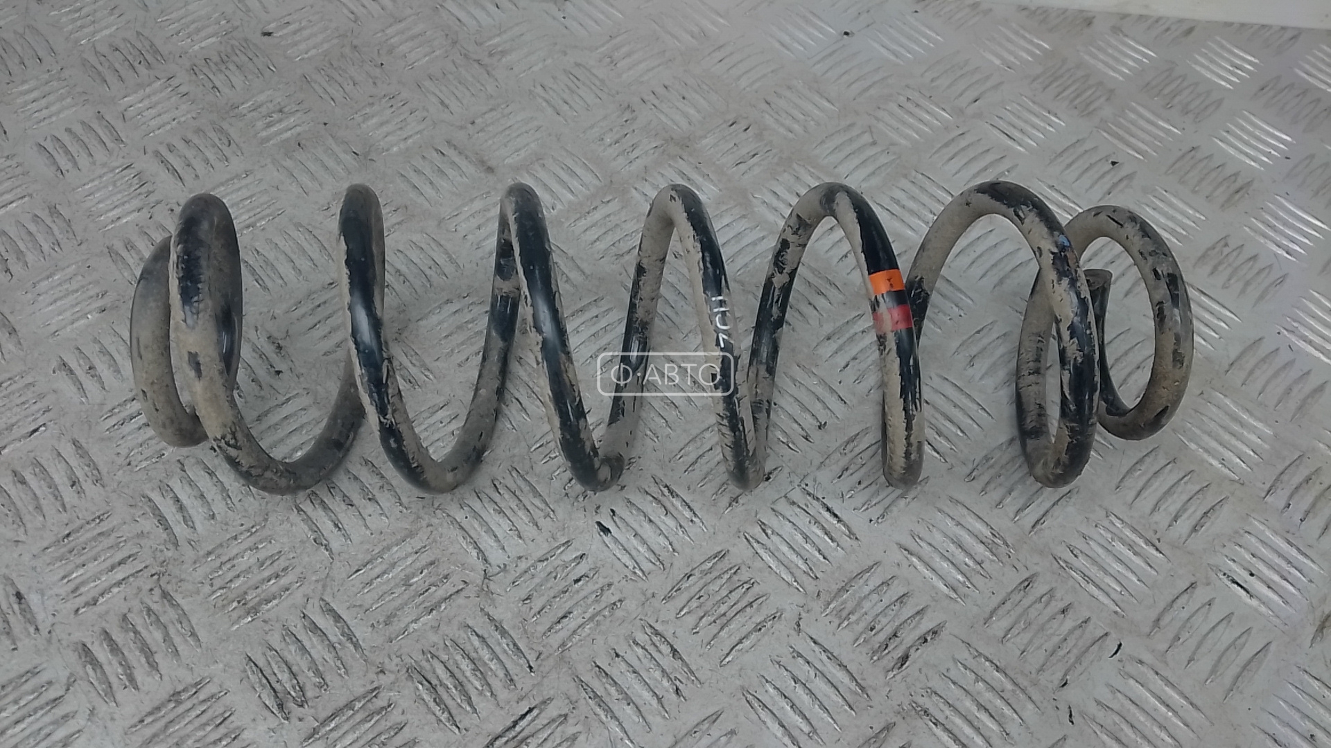 Пружина задняя