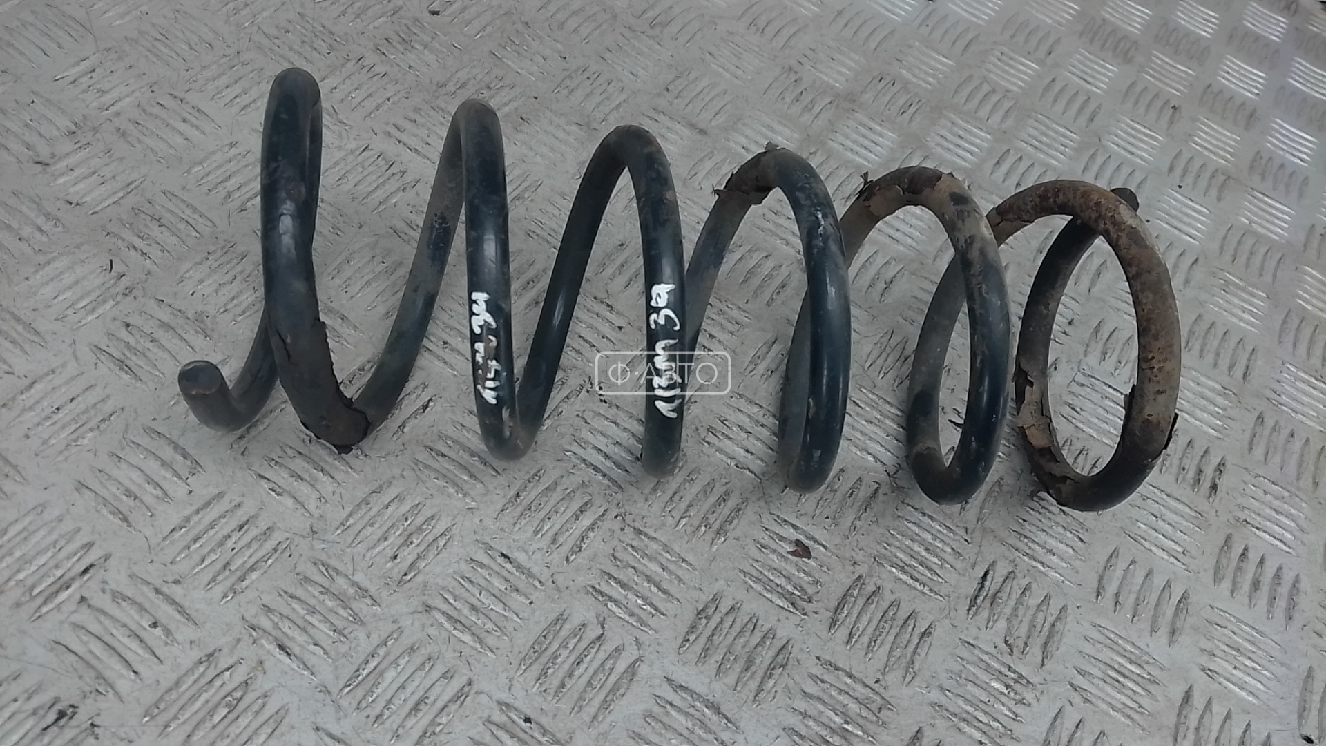 Пружина задняя