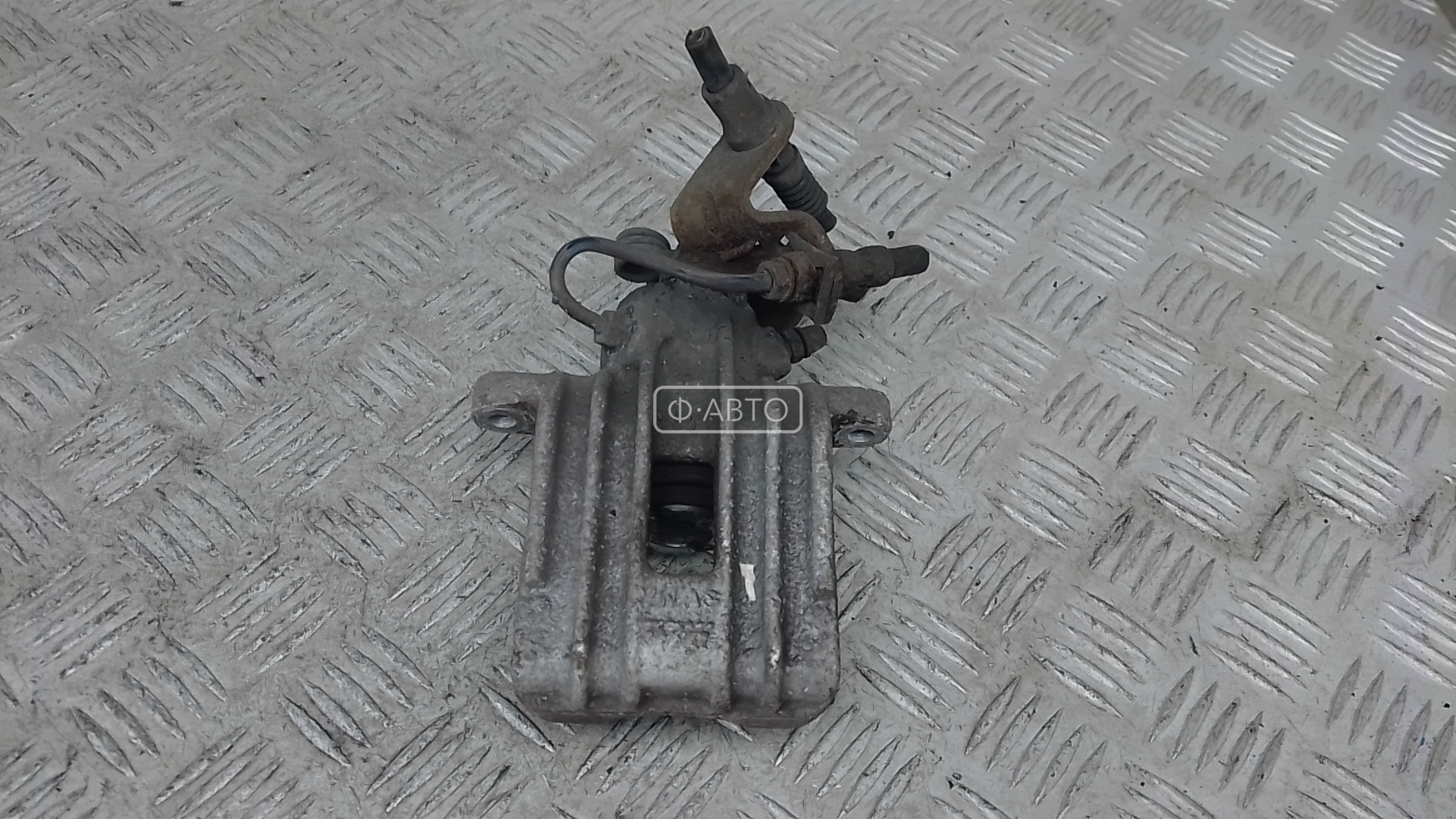 Суппорт тормозной задний левый