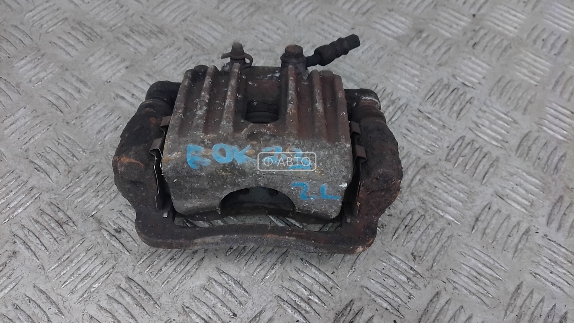 Суппорт тормозной задний левый