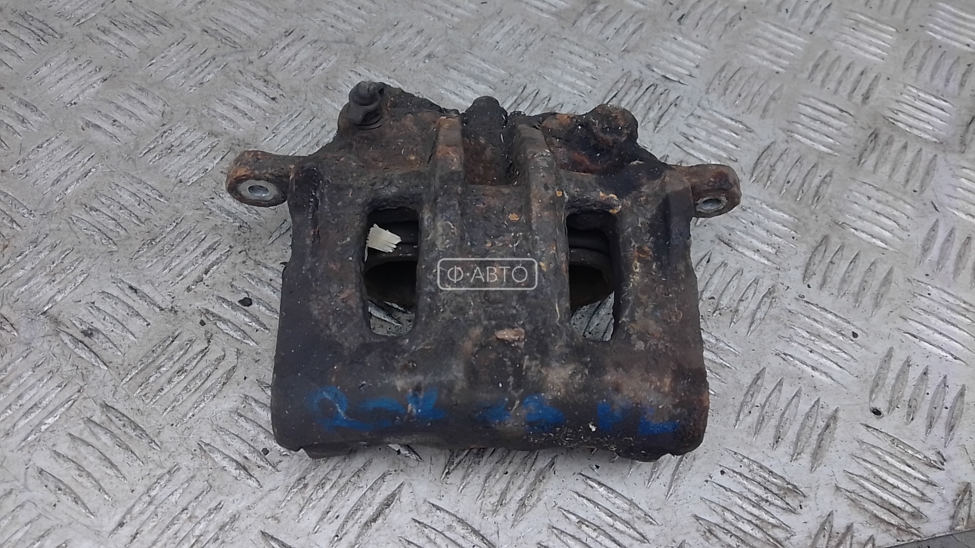 Суппорт тормозной передний левый