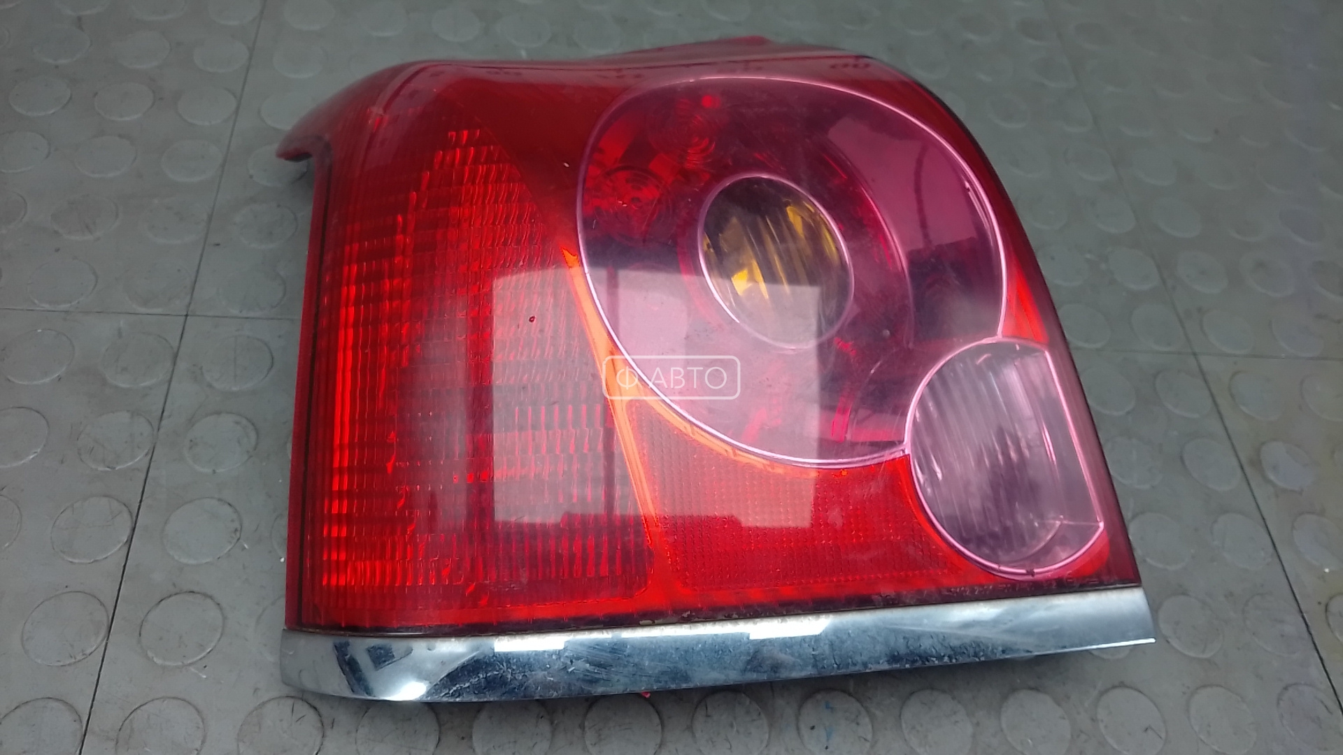 Фонарь задний левый