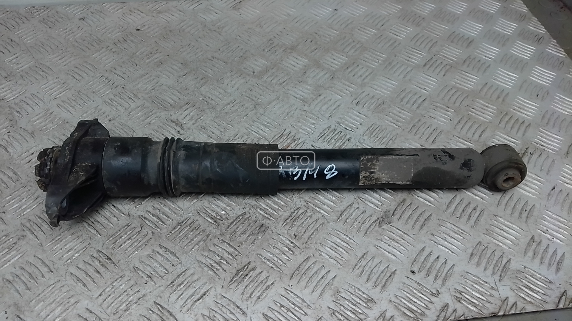 Амортизатор задней балки