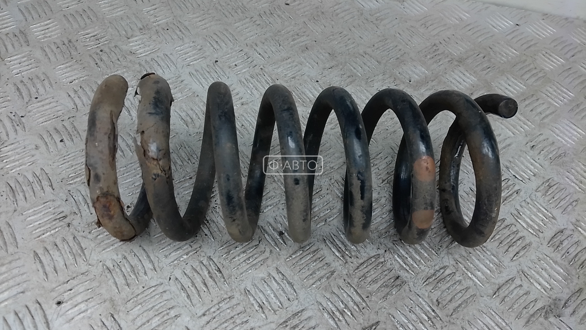 Пружина задняя